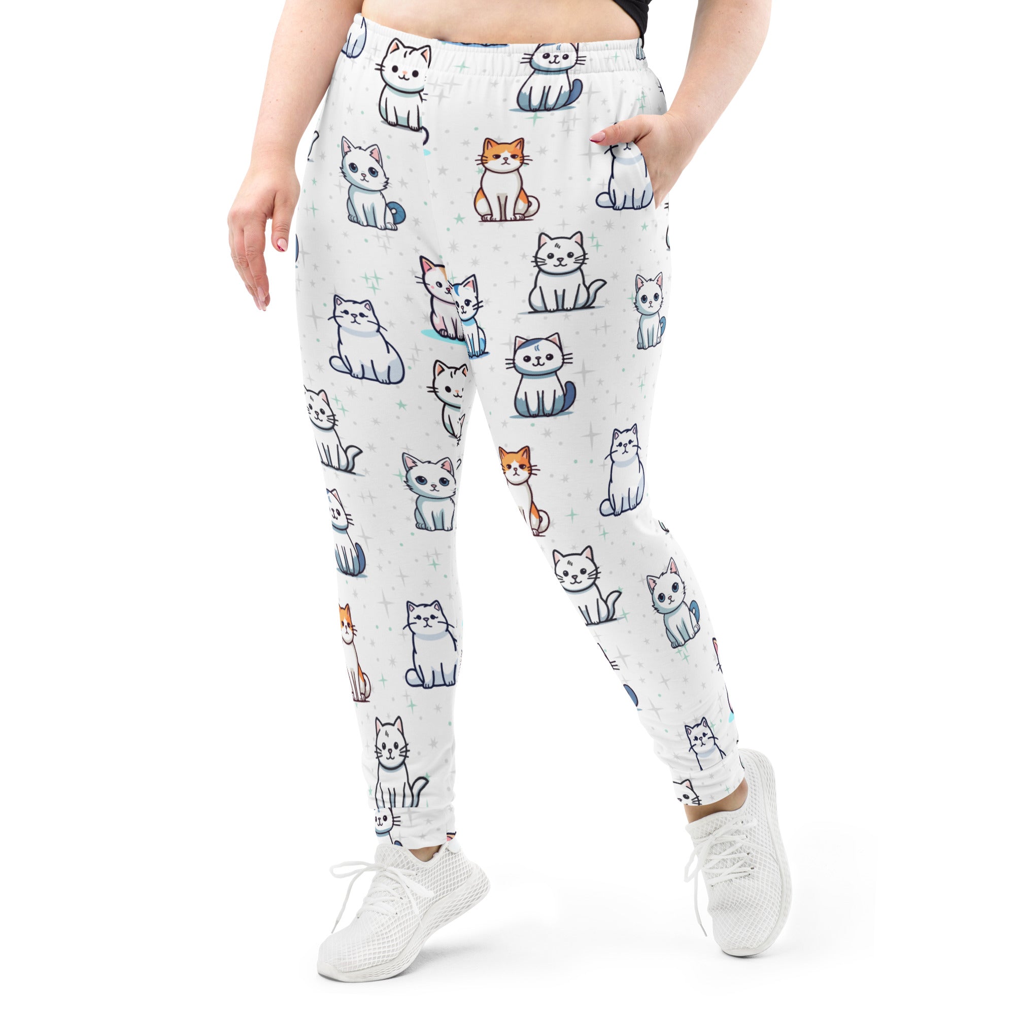 White plus-size joggers with playful multicolored cartoon cats made from cozy recycled fleece with pockets