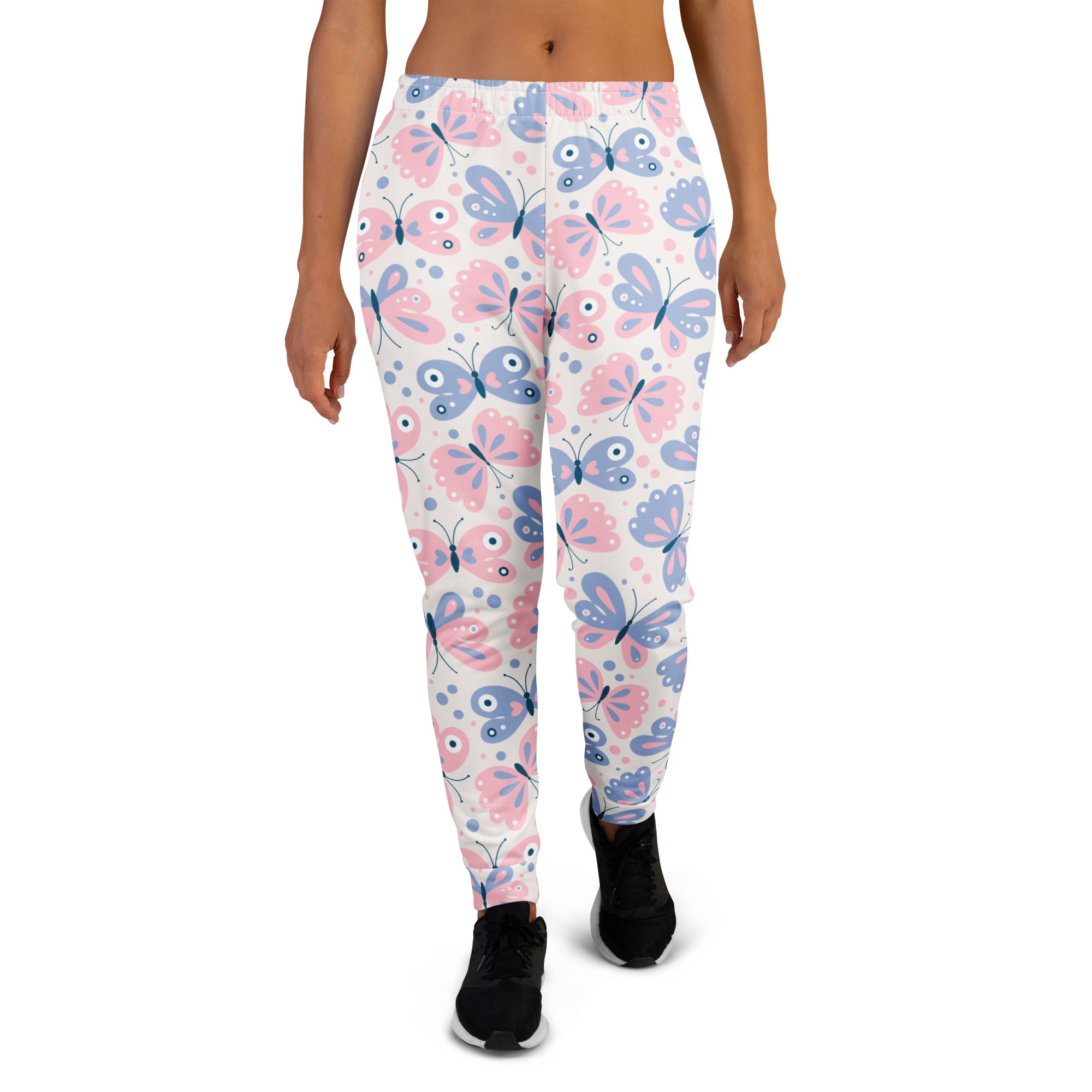 Women’s butterfly recycled jogger pants with pink and blue butterfly pattern on white base and cozy fleece lining