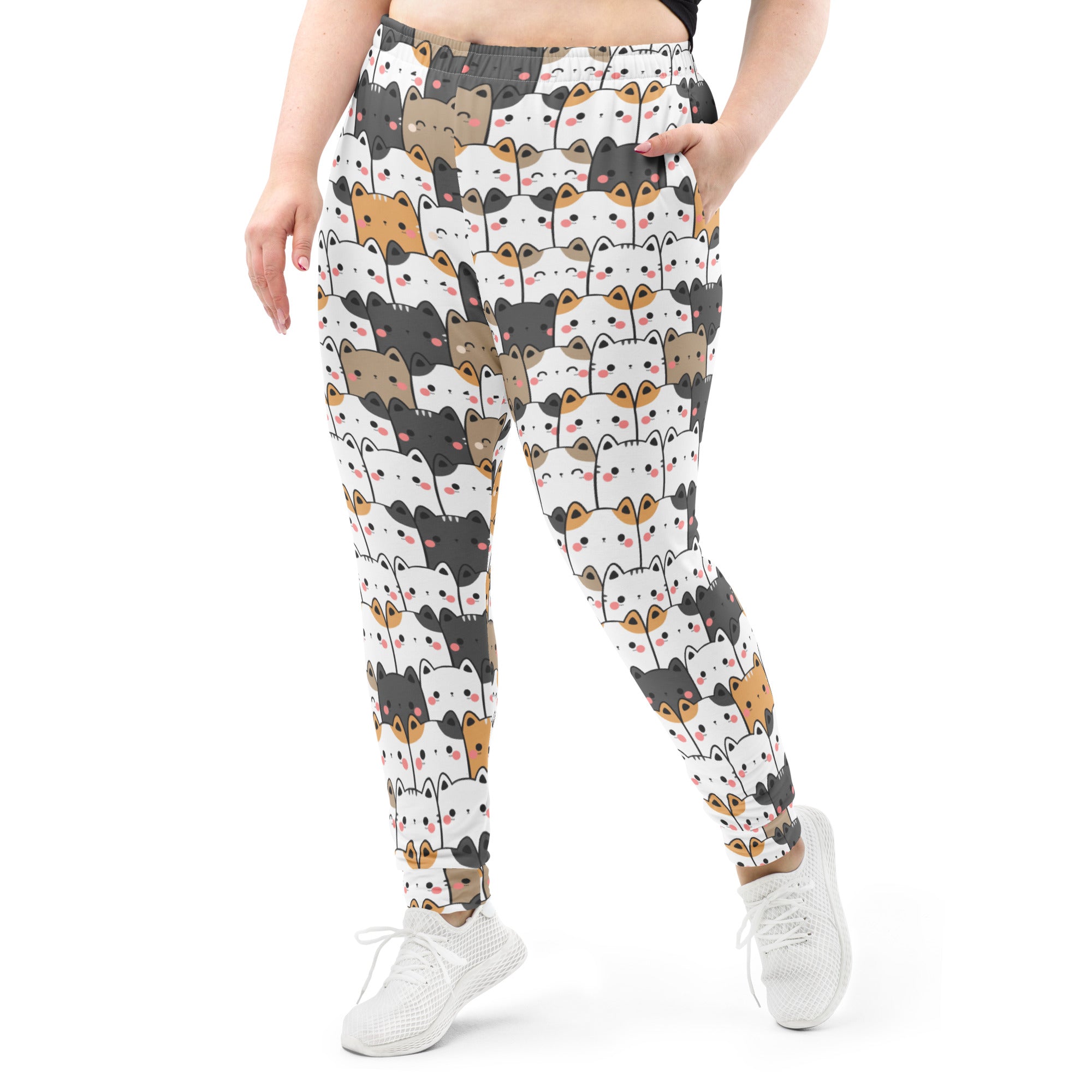 White plus-size recycled jogger pants with cozy fleece inside featuring playful kawaii cat pattern and pockets