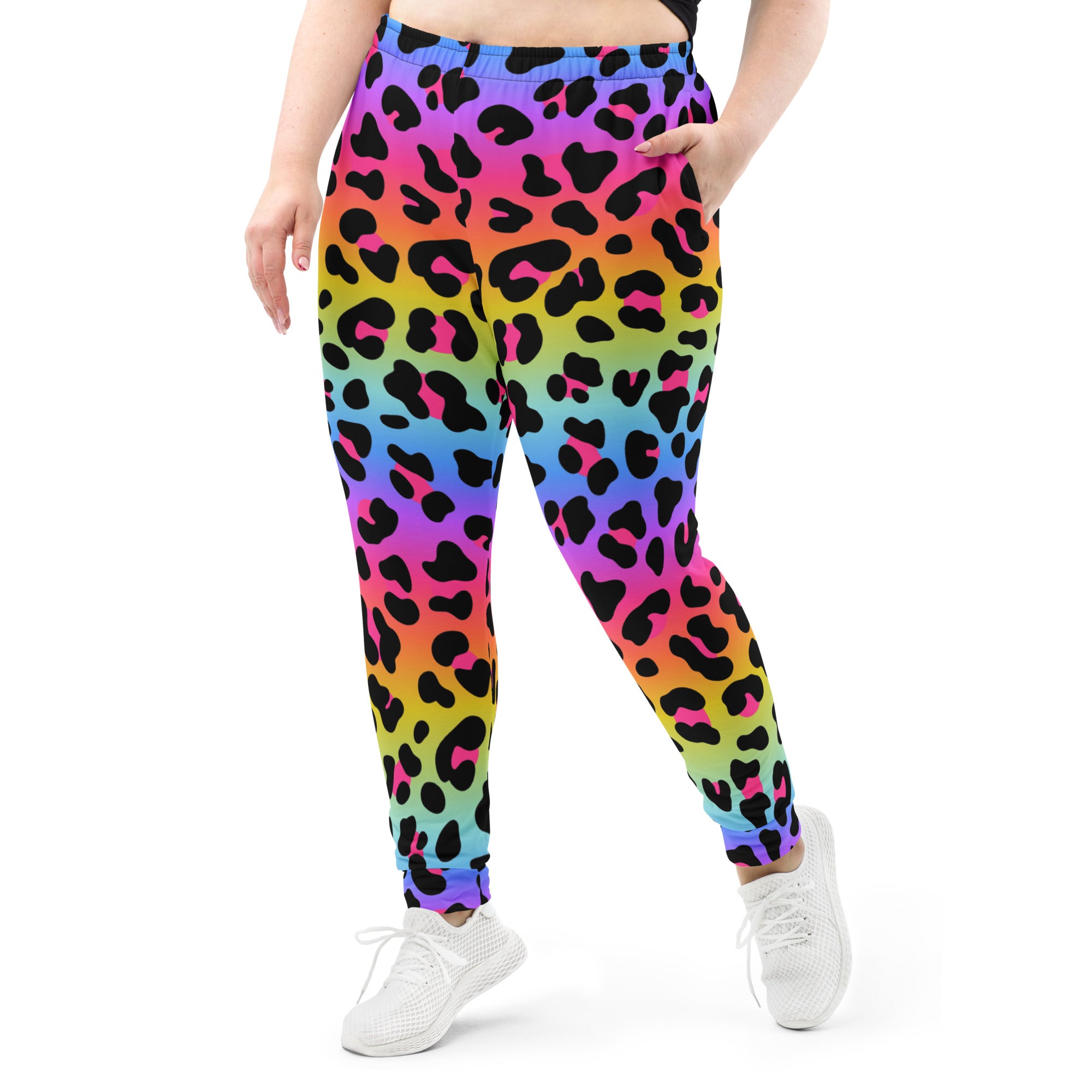 Women’s rainbow gradient leopard print jogger pants with cozy brushed inside fleece and pockets made from recycled materials