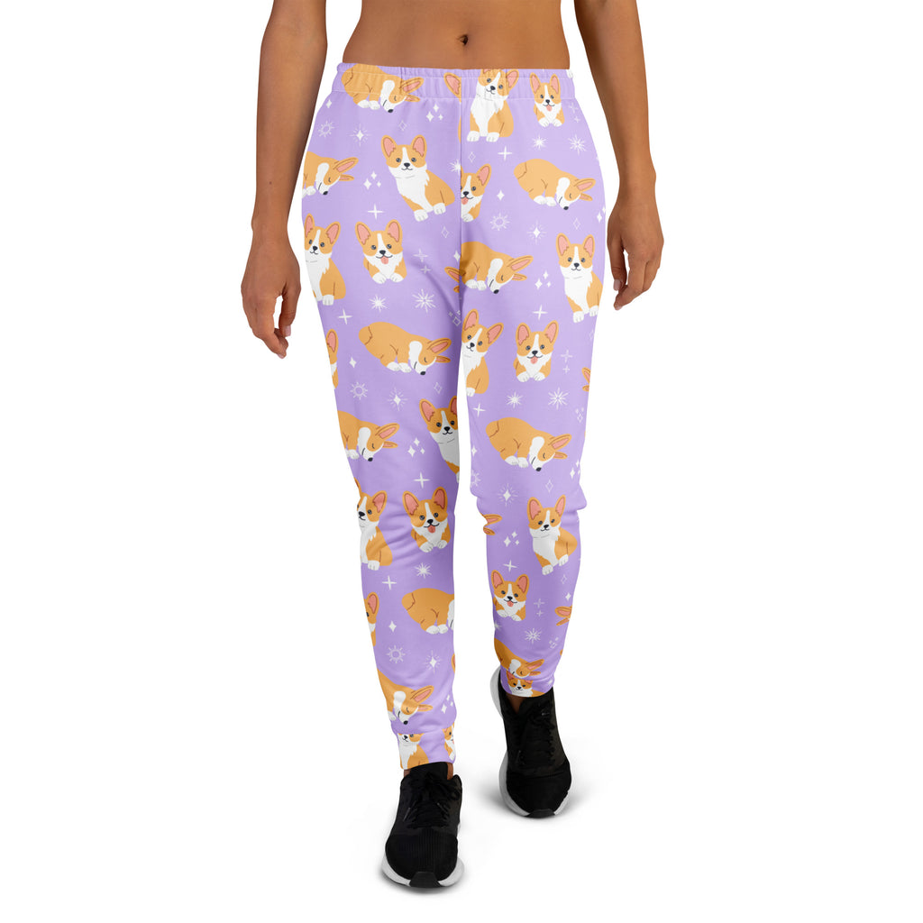 Women’s purple recycled jogger pants with playful orange and white corgis and star accents cozy fleece inside