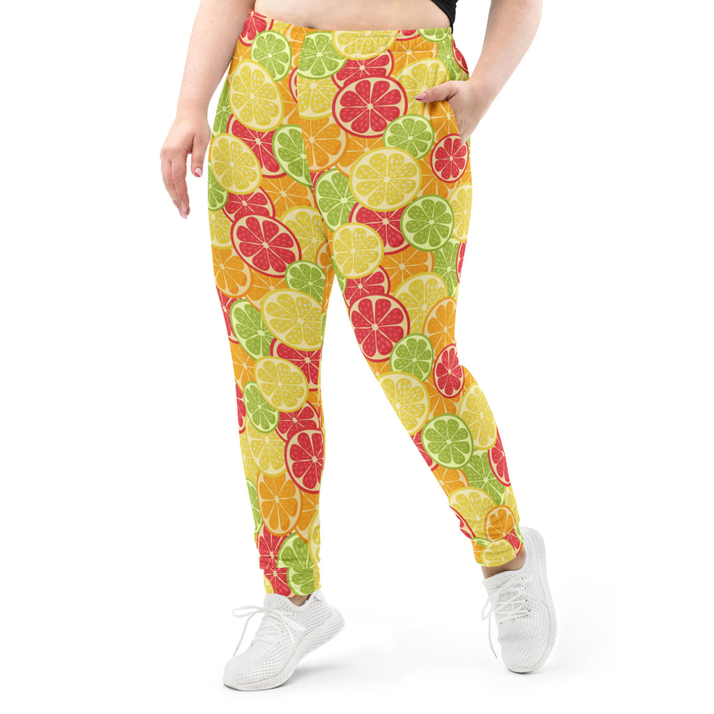 Women’s citrus slice recycled jogger pants with pockets in vibrant lemon lime and grapefruit print with cozy fleece lining