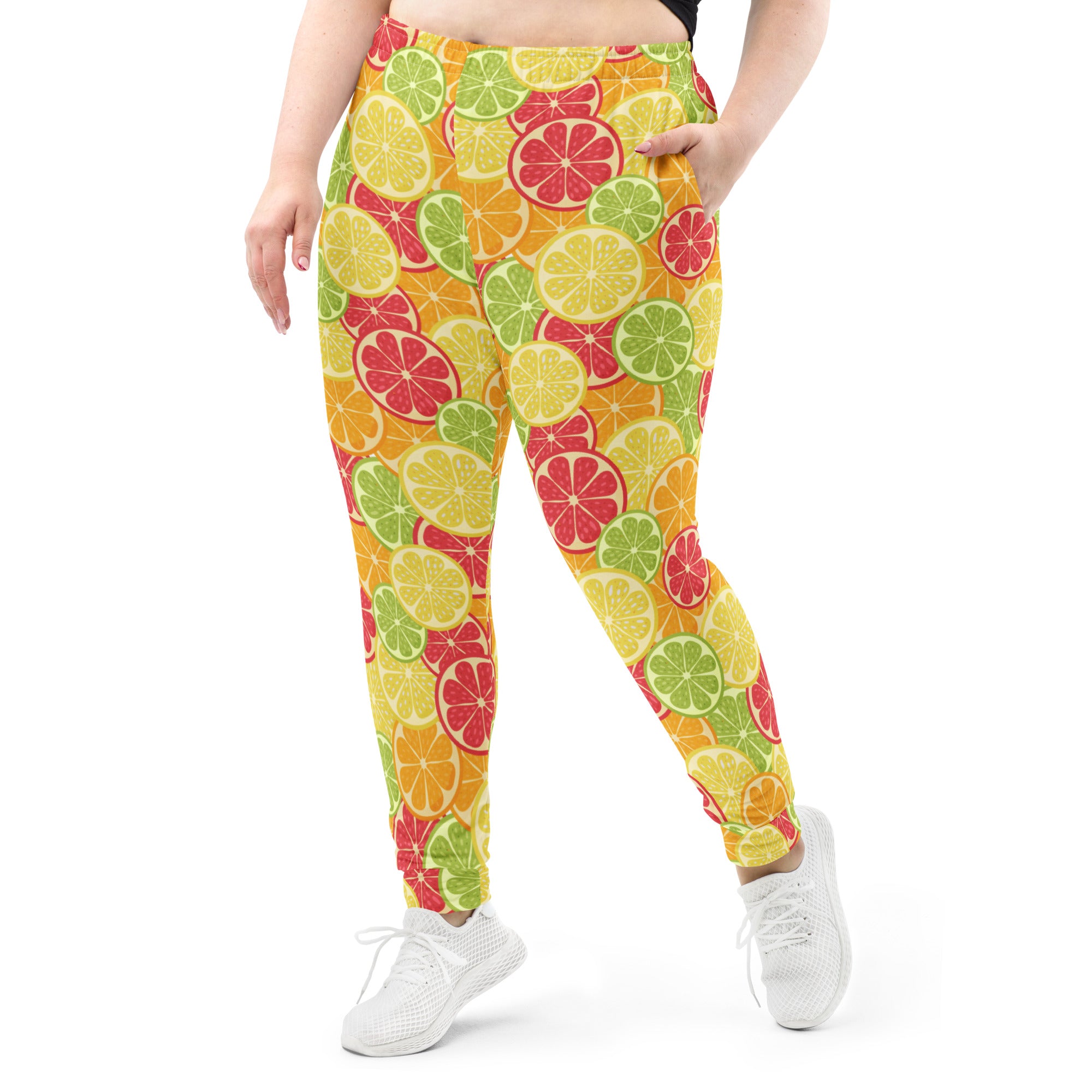 Women’s citrus slice recycled jogger pants with pockets in vibrant lemon lime and grapefruit print with cozy fleece lining
