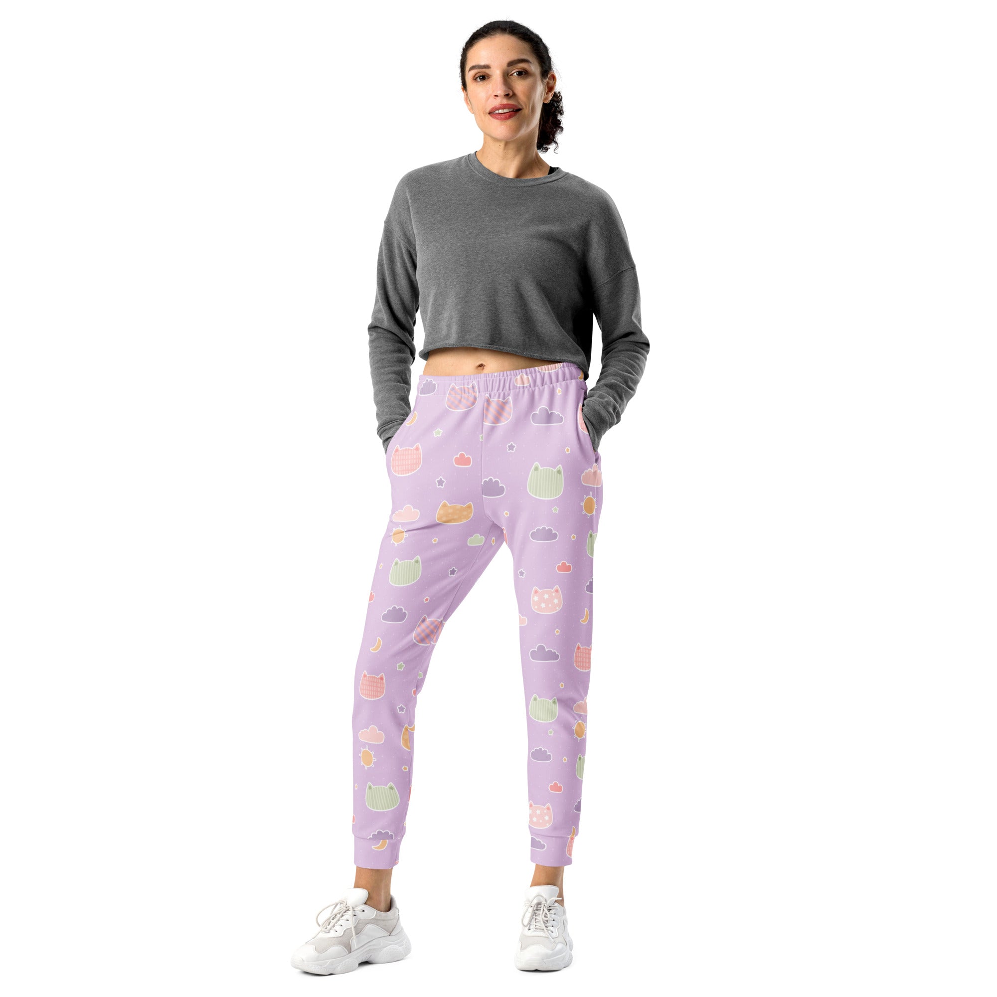 Women’s pastel purple recycled jogger pants with playful kawaii cats and clouds pattern and cozy brushed fleece lining