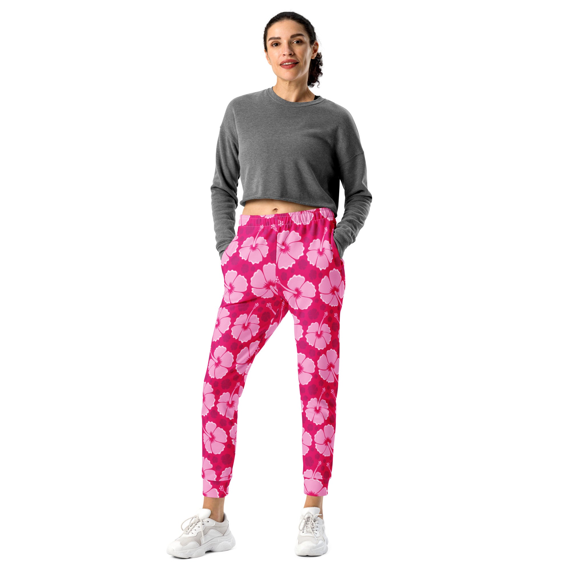 Women’s pink hibiscus floral recycled jogger pants with pockets and cozy brushed inside fleece in vibrant magenta