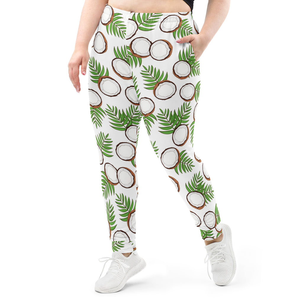 White leggings with playful coconut and green palm leaf pattern made of cozy recycled fleece with pockets