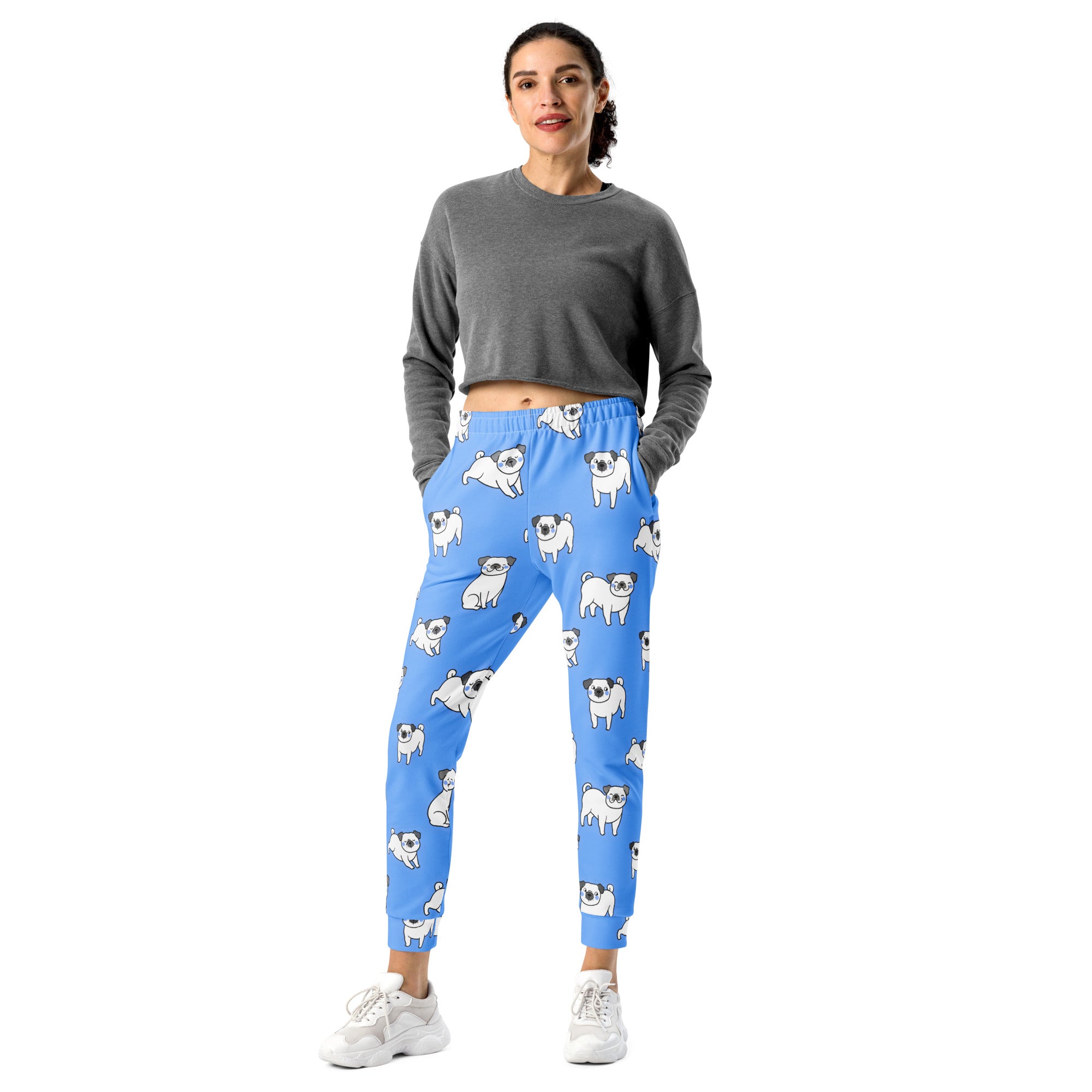 Women’s blue recycled jogger pants with cozy brushed fleece inside and white pug illustrations with pockets