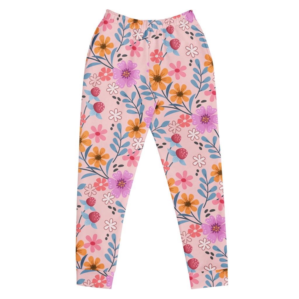 Women’s pink floral recycled jogger pants with cozy brushed fleece inside featuring vibrant purple orange and pink flowers