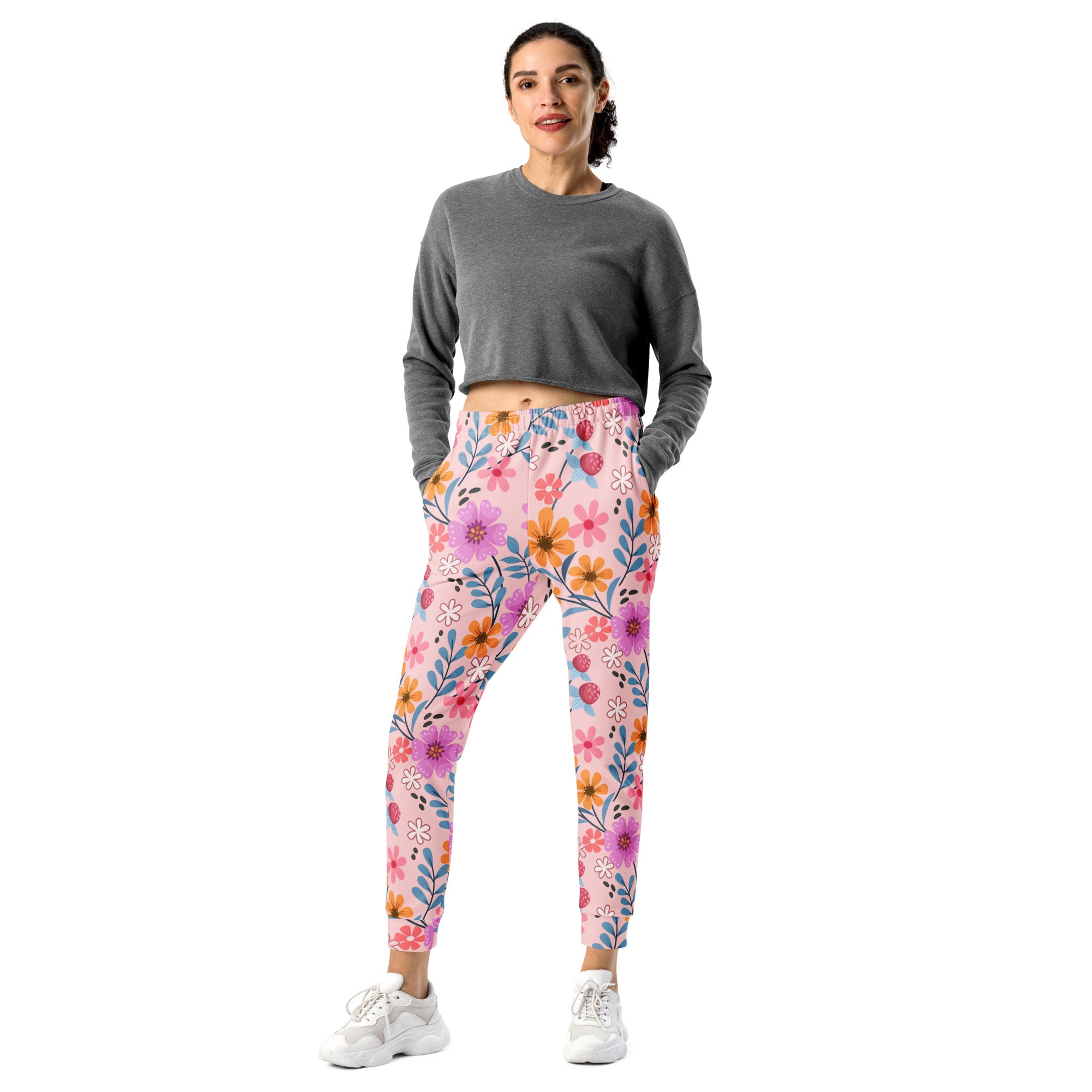 Women’s pink floral recycled jogger pants with soft stretchy fabric elastic waistband and cozy brushed fleece inside