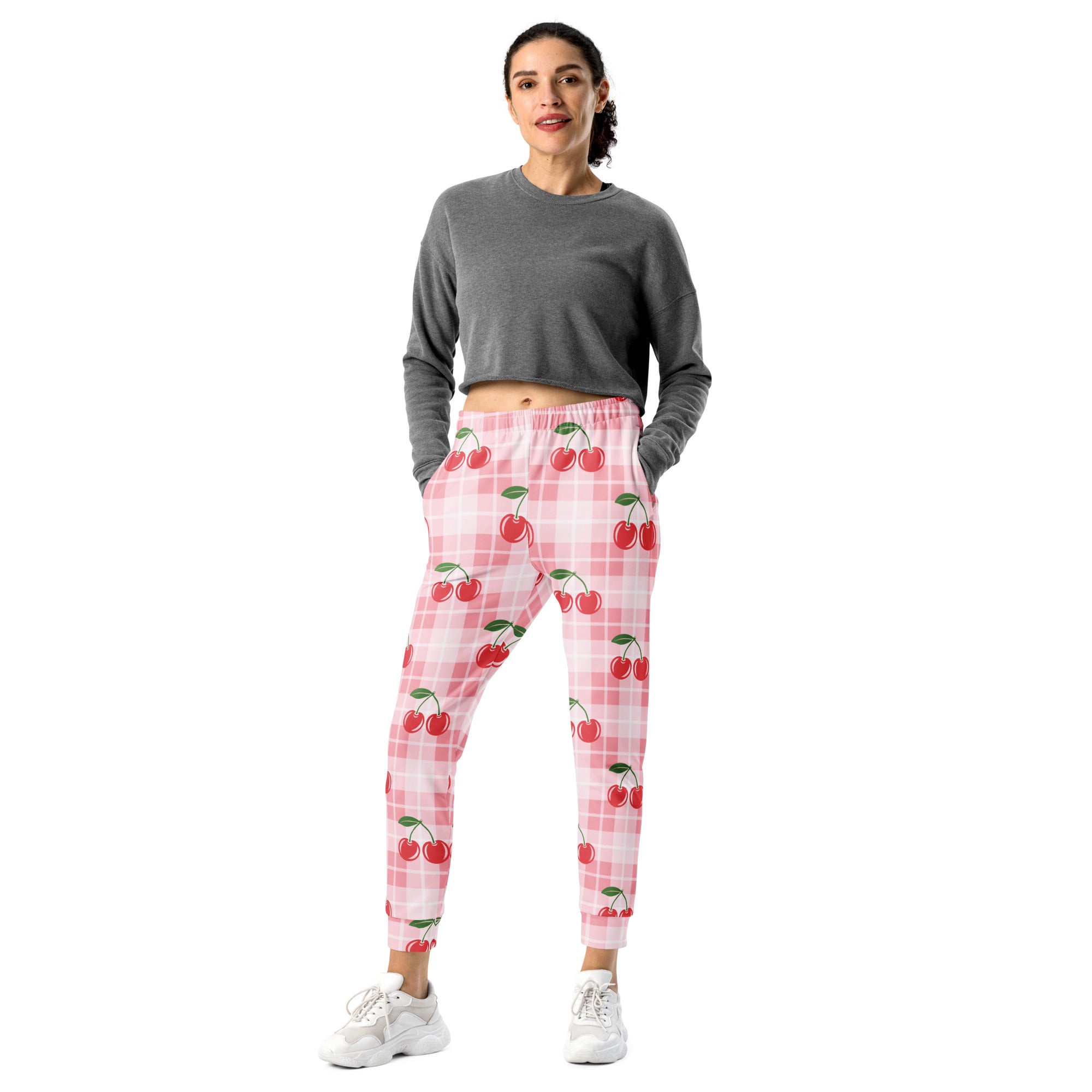 Women’s pink and white plaid jogger pants with playful cherry pattern cozy brushed inside fleece pockets