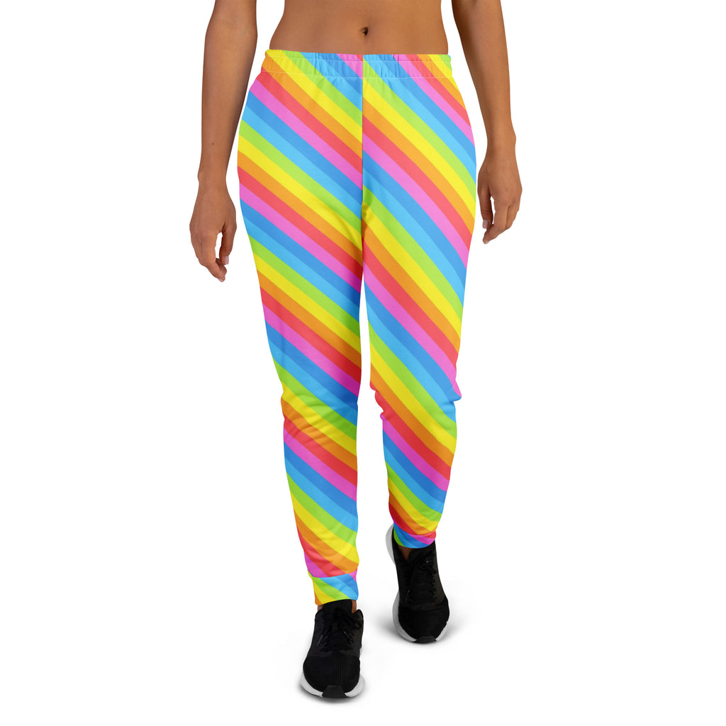 Women’s rainbow stripe recycled jogger pants with cozy brushed fleece inside and vibrant diagonal neon pink yellow blue green pattern