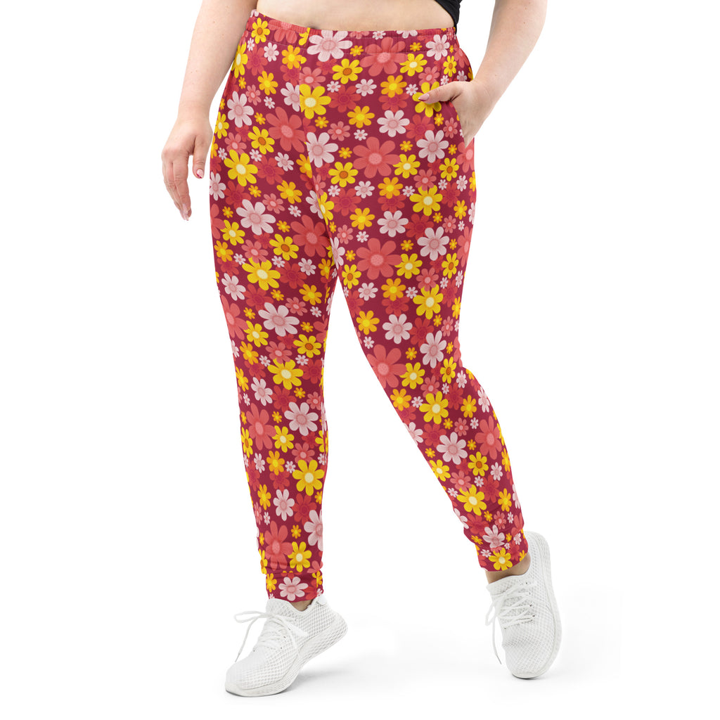 Women’s red floral recycled jogger pants with yellow and pink flowers cozy brushed inside fleece with pockets