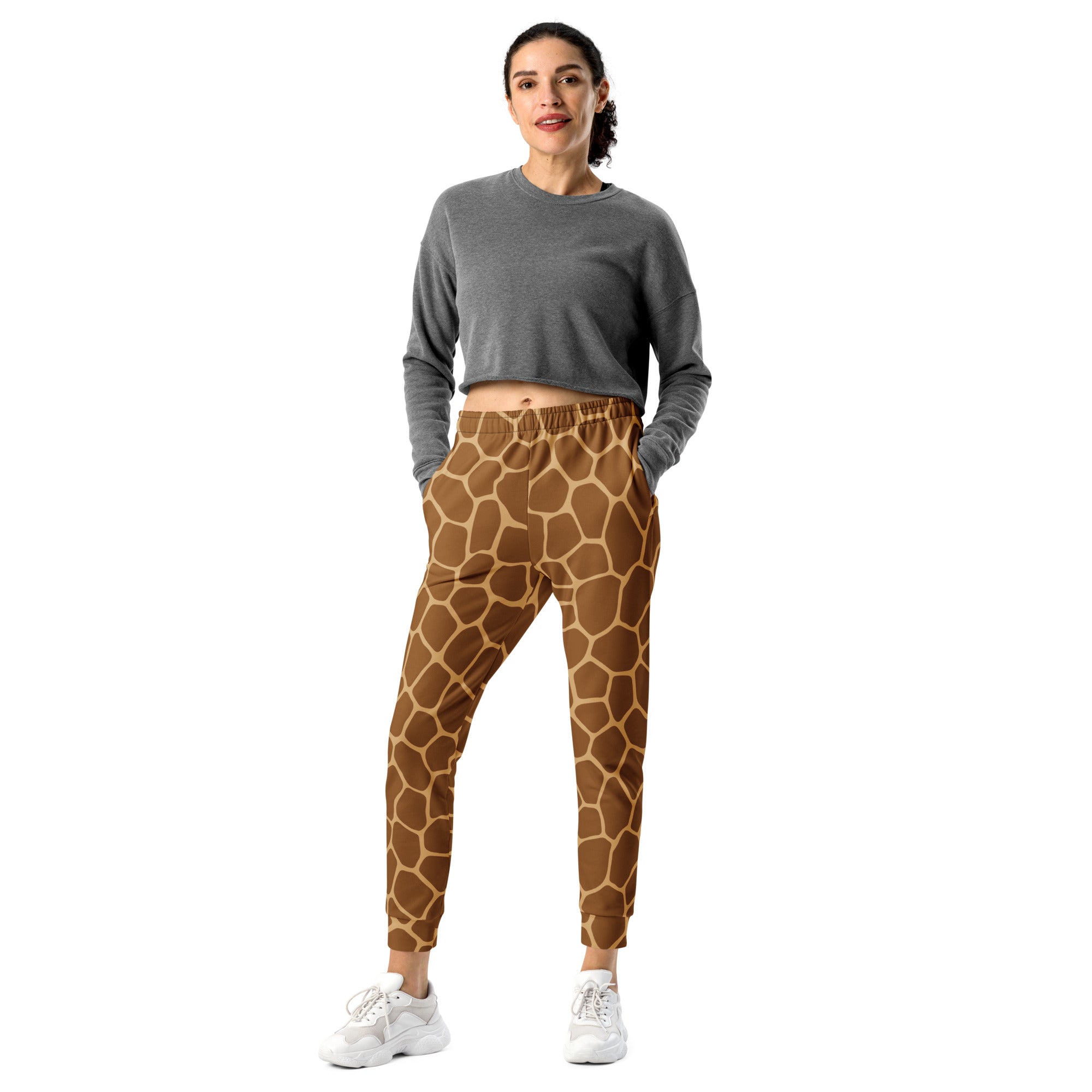 Women’s brown and tan giraffe print recycled jogger pants with elastic waistband and cozy brushed fleece lining