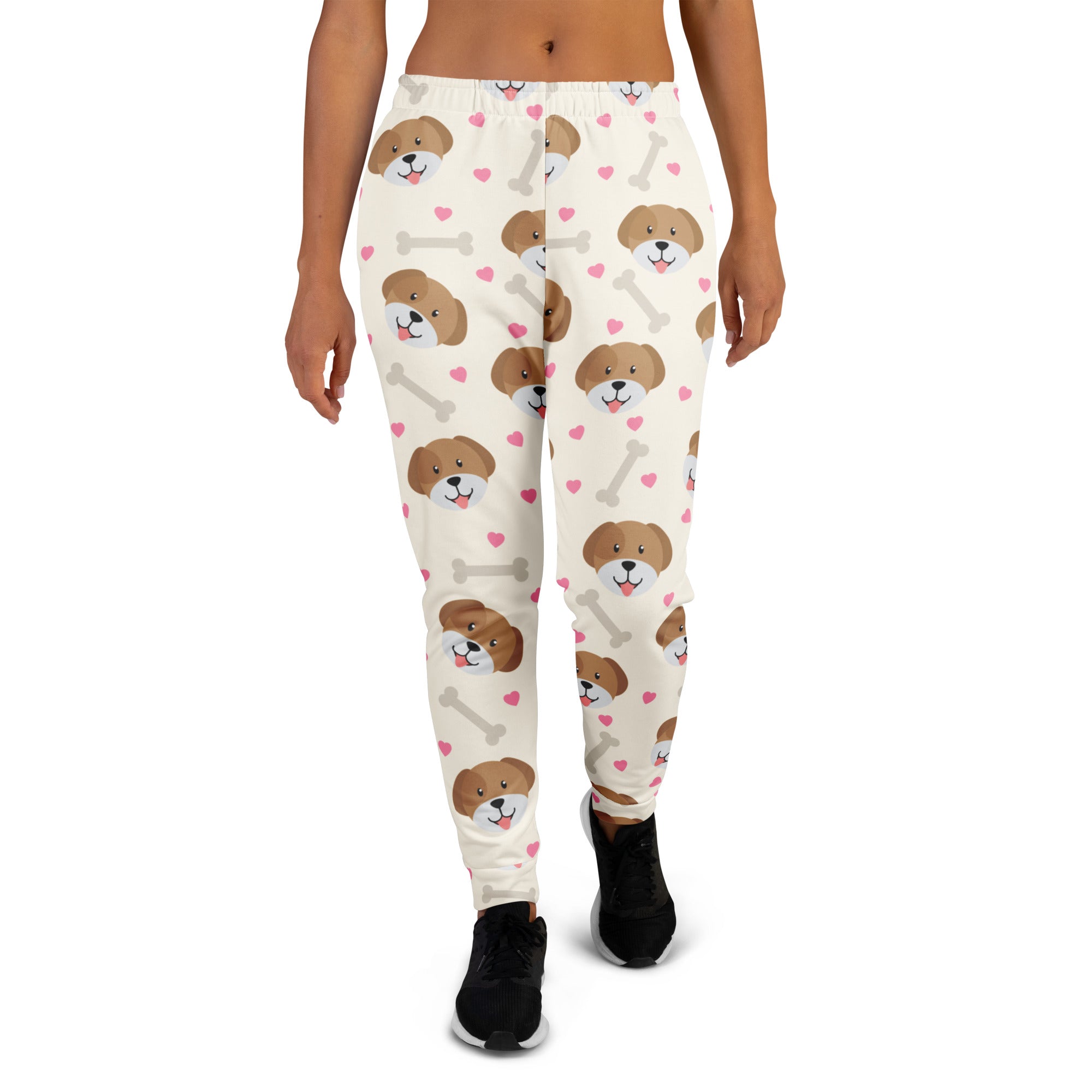 Cream-colored women’s recycled jogger pants with brown puppy faces pink hearts gray bones cozy brushed fleece lining