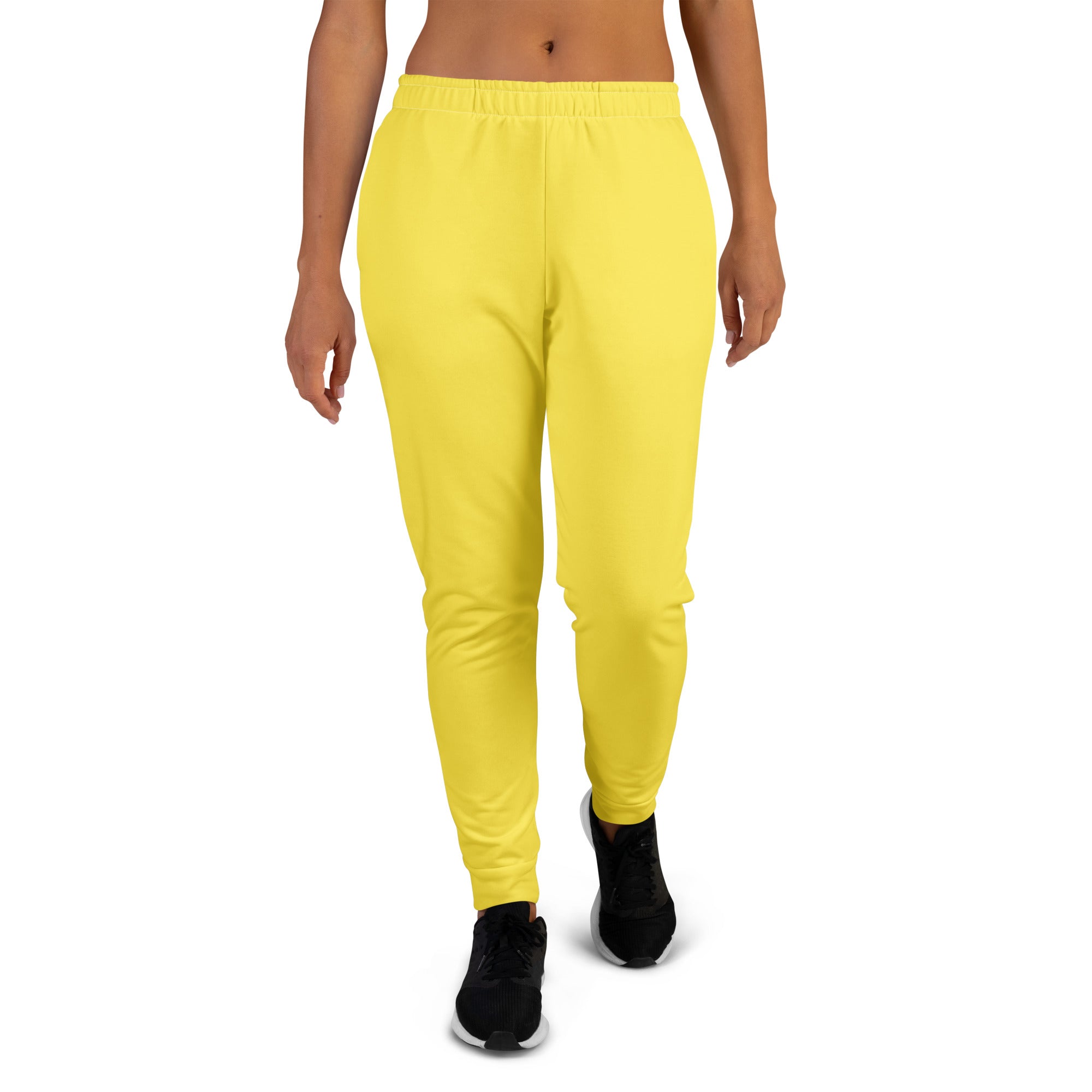 Women’s bright yellow recycled jogger pants with elastic waistband tapered legs and cozy brushed inside fleece lining