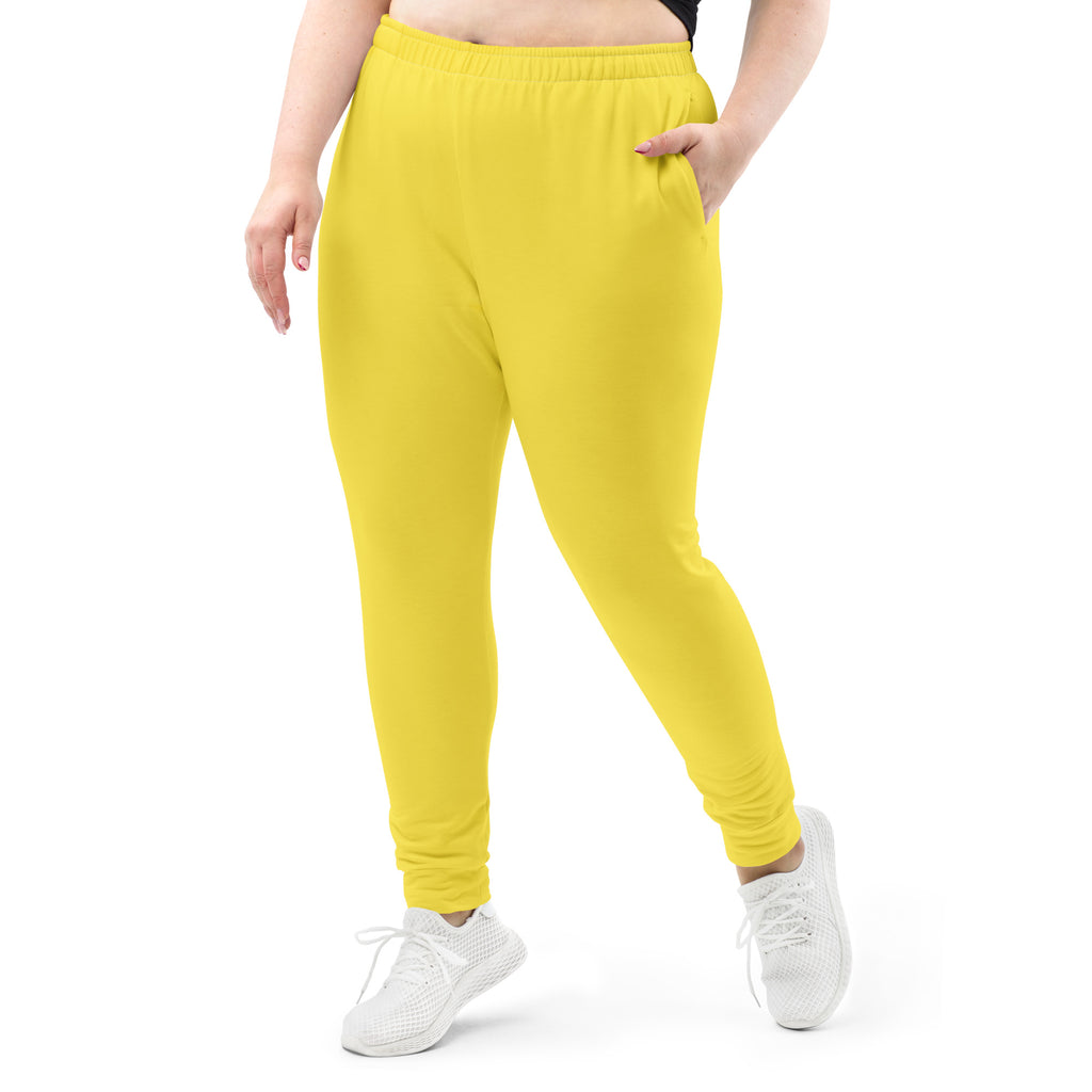Women’s yellow recycled jogger pants with soft brushed fleece inside elastic waistband and cuffed ankles with pockets