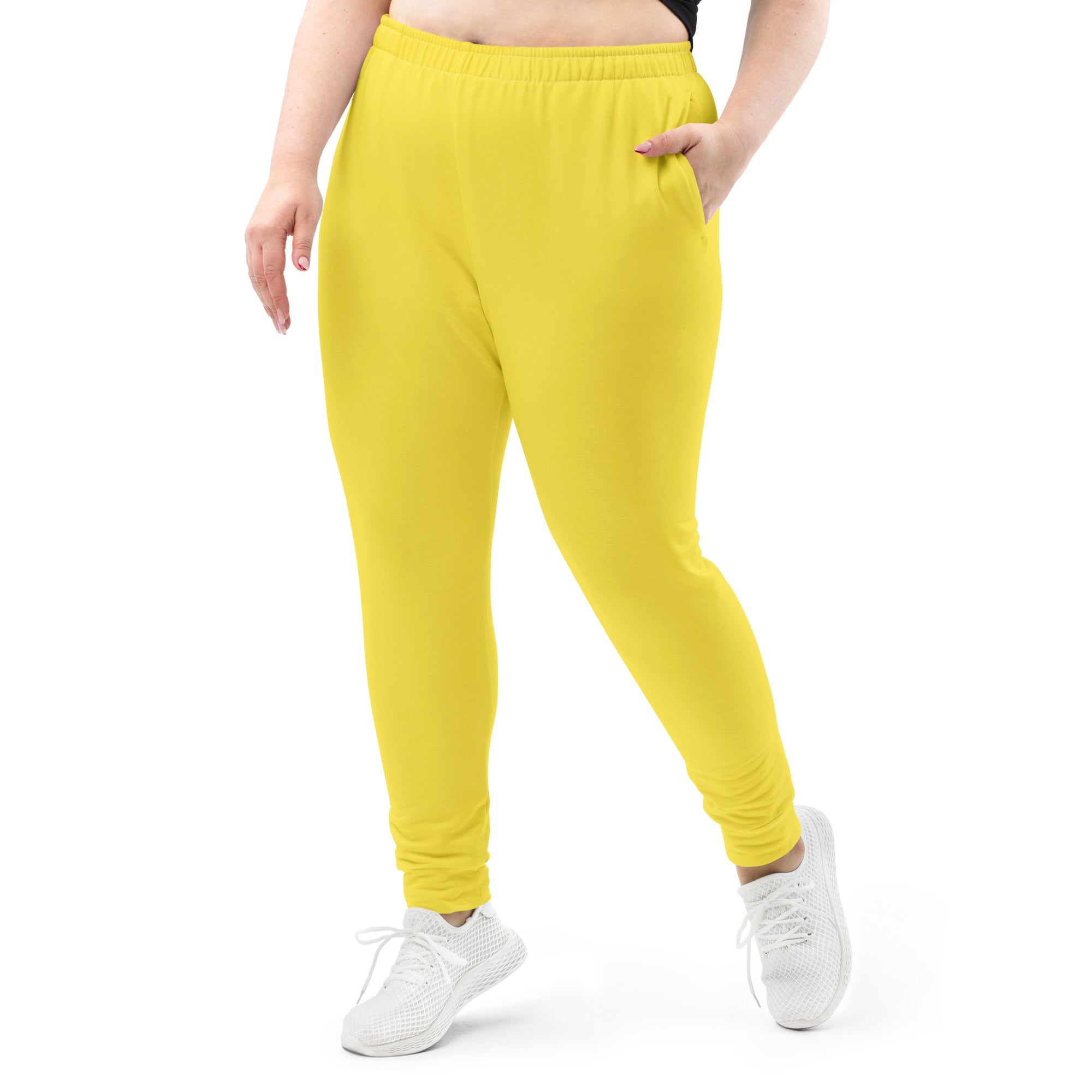 Women’s yellow recycled jogger pants with soft brushed fleece inside elastic waistband and cuffed ankles with pockets