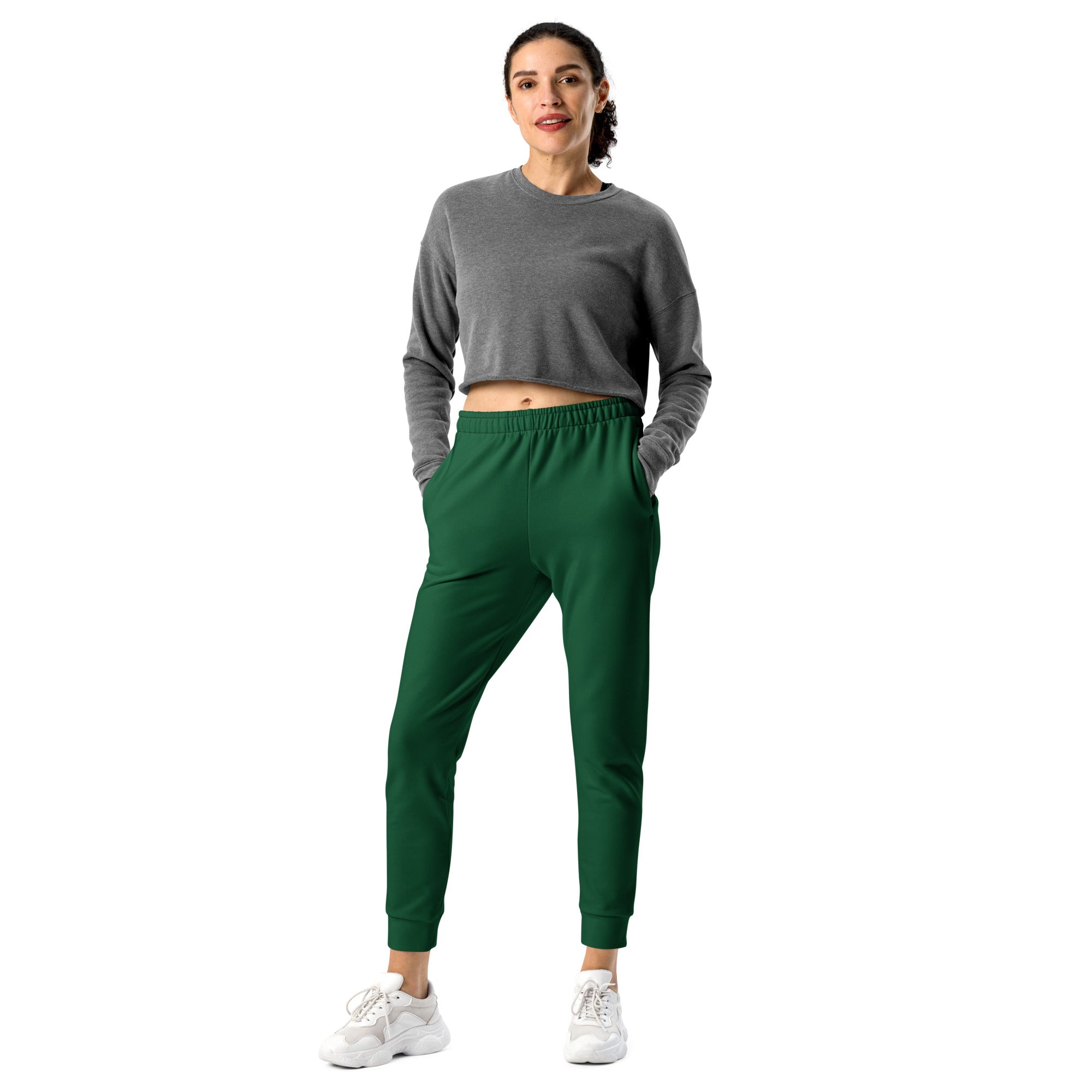 Women’s dark green recycled jogger pants with pockets featuring cozy brushed inside fleece and soft textured fabric