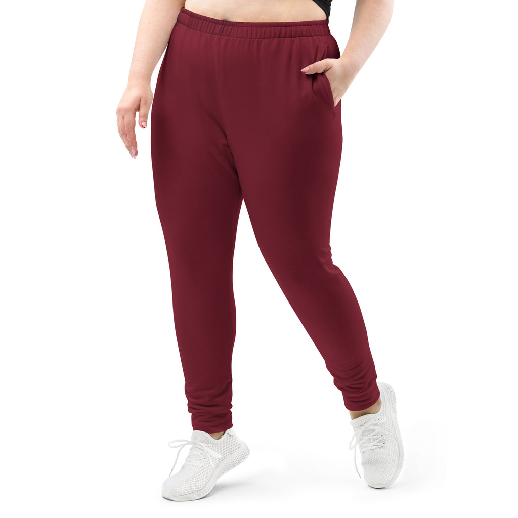 Women’s burgundy plus-size recycled jogger pants with elastic waistband ribbed cuffs and cozy brushed fleece lining