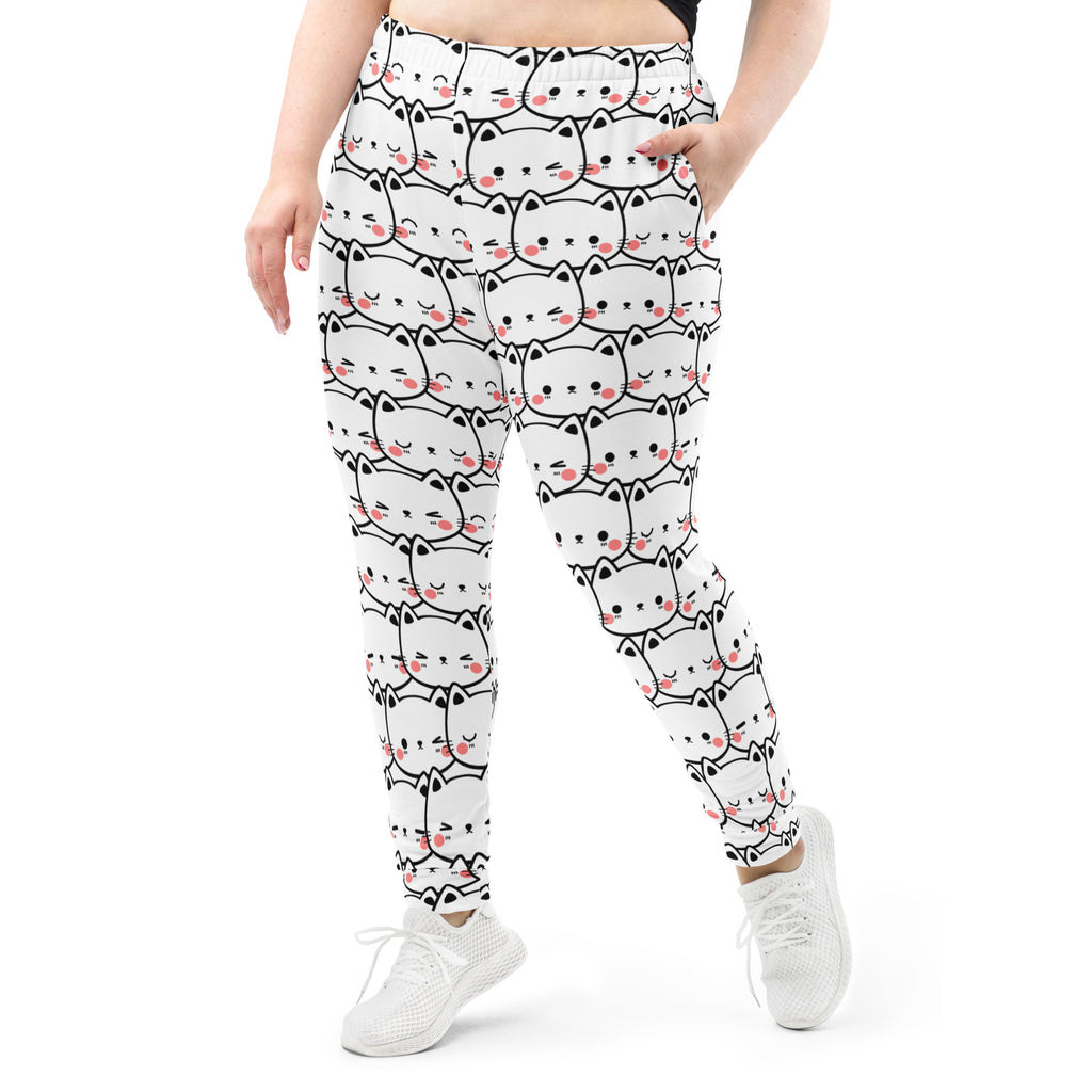 White women’s recycled jogger pants with black outlined cartoon cat print pink cheeks cozy brushed fleece lining