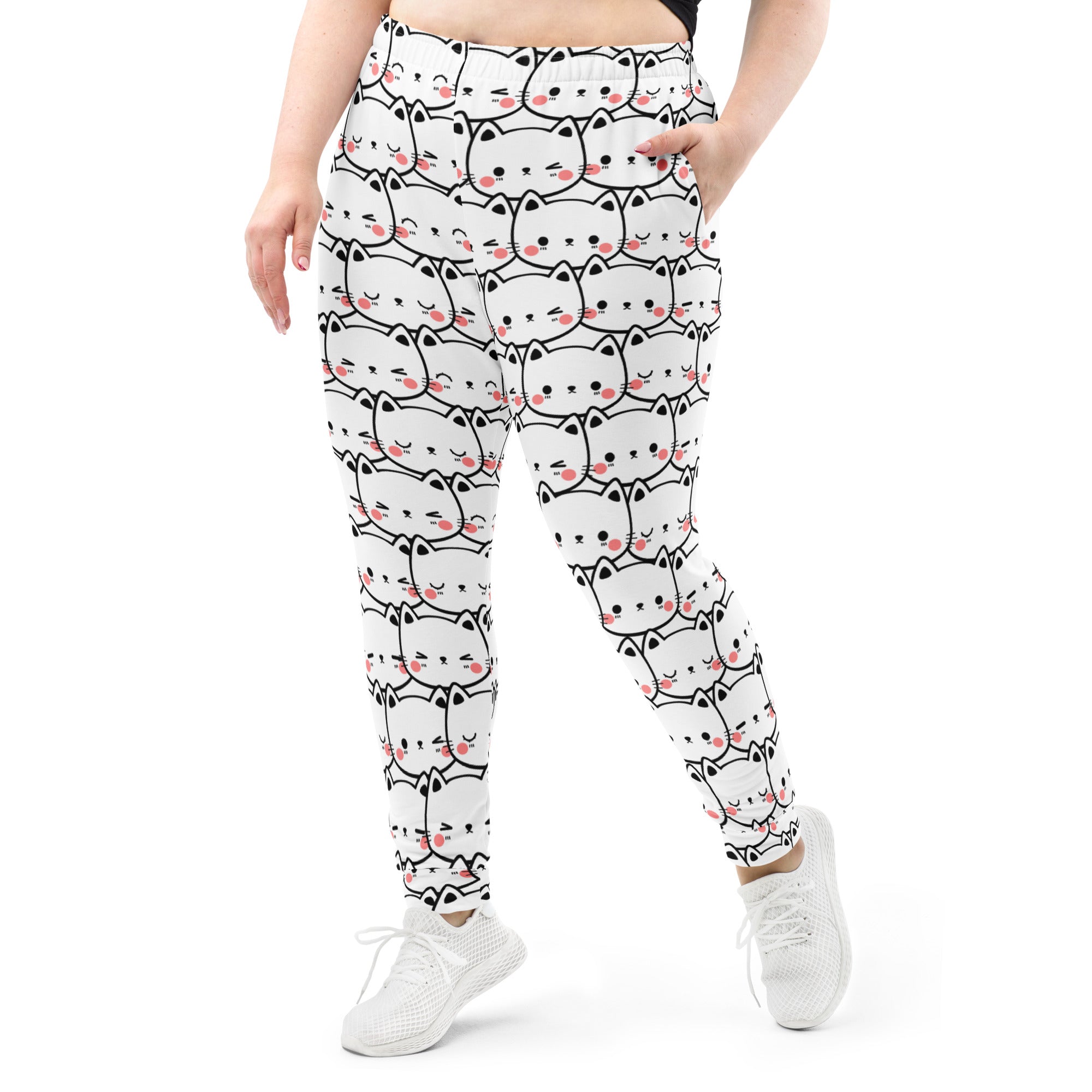 White women’s recycled jogger pants with black outlined cartoon cat print pink cheeks cozy brushed fleece lining