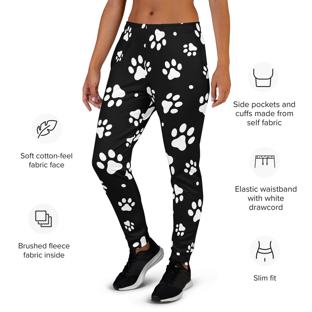 Women’s black jogger pants with white paw print pattern made from recycled soft cotton-feel fabric with cozy fleece lining