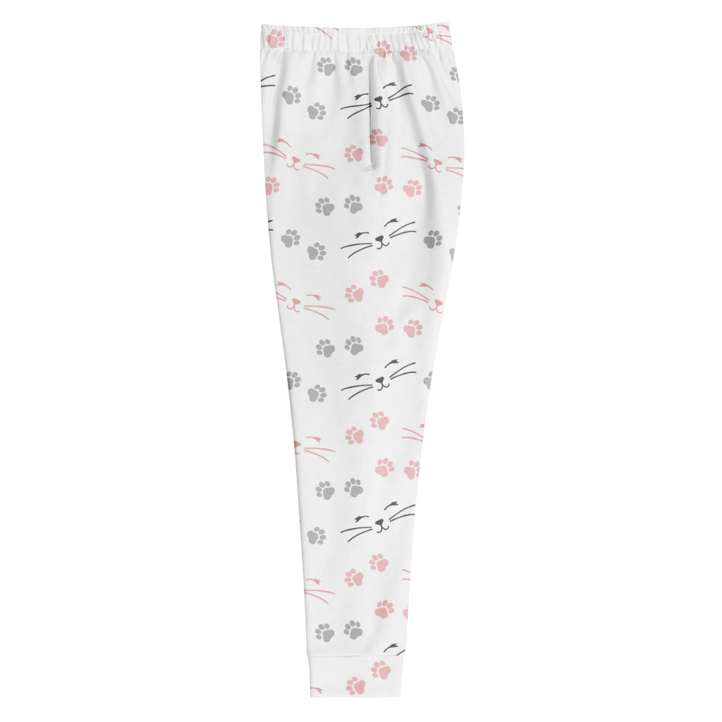 White recycled jogger pants with cozy brushed fleece inside featuring pink and gray cat faces whiskers and paw prints