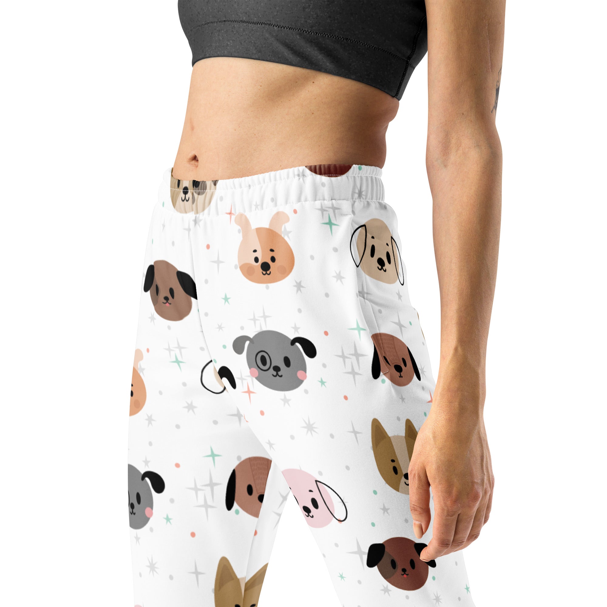 White leggings with colorful cartoon dogs and star sparkles featuring cozy brushed inside fleece material