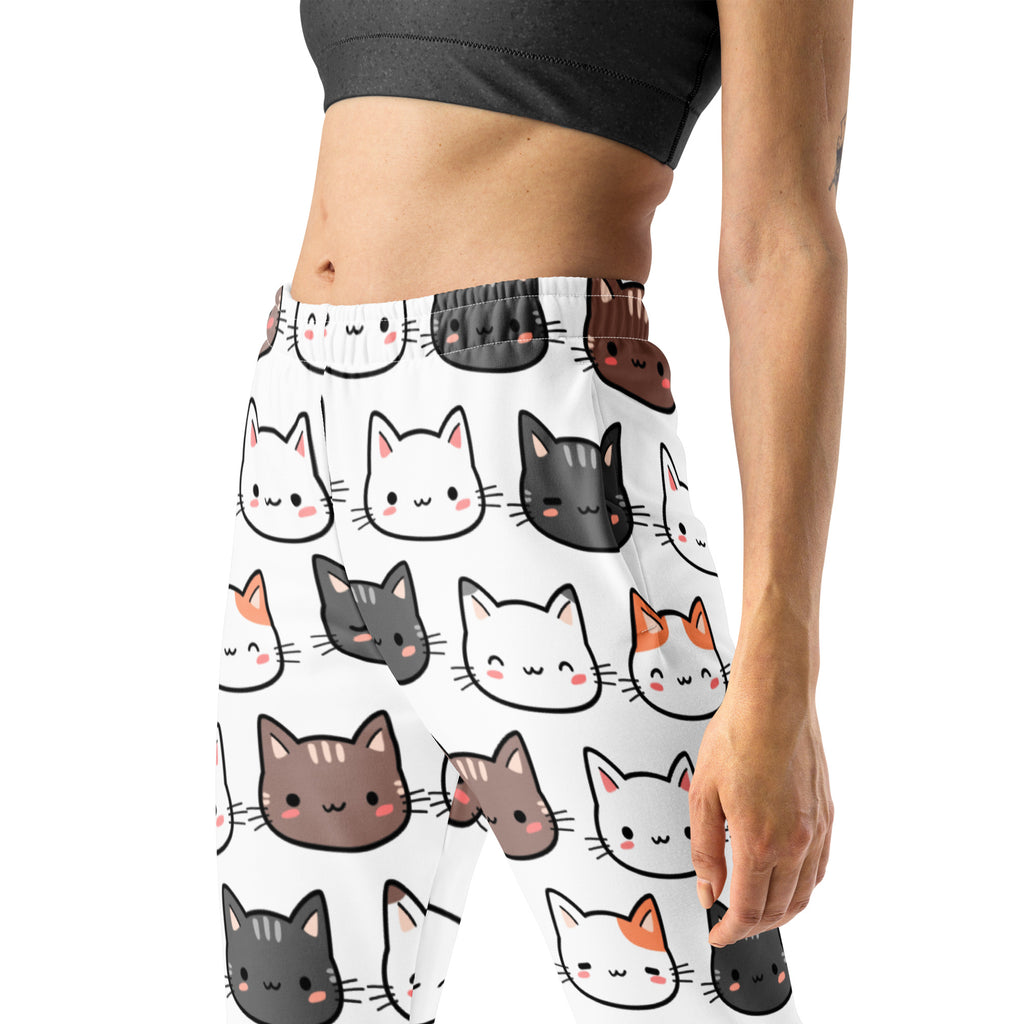 Women’s white recycled jogger pants with cozy brushed fleece inside and colorful cartoon cat pattern with pockets