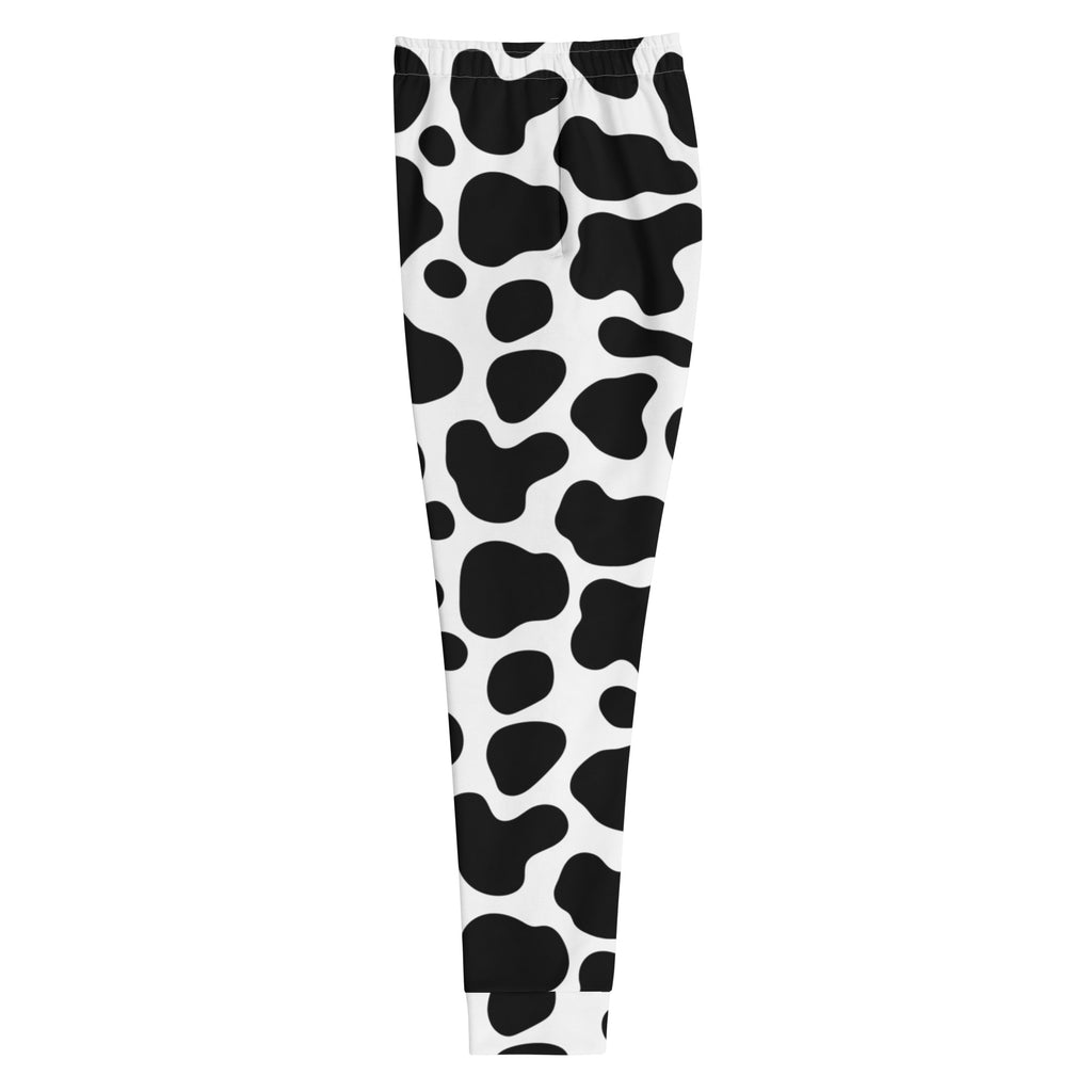 Women’s cow print recycled jogger pants with pockets featuring black and white pattern and cozy brushed inside fleece