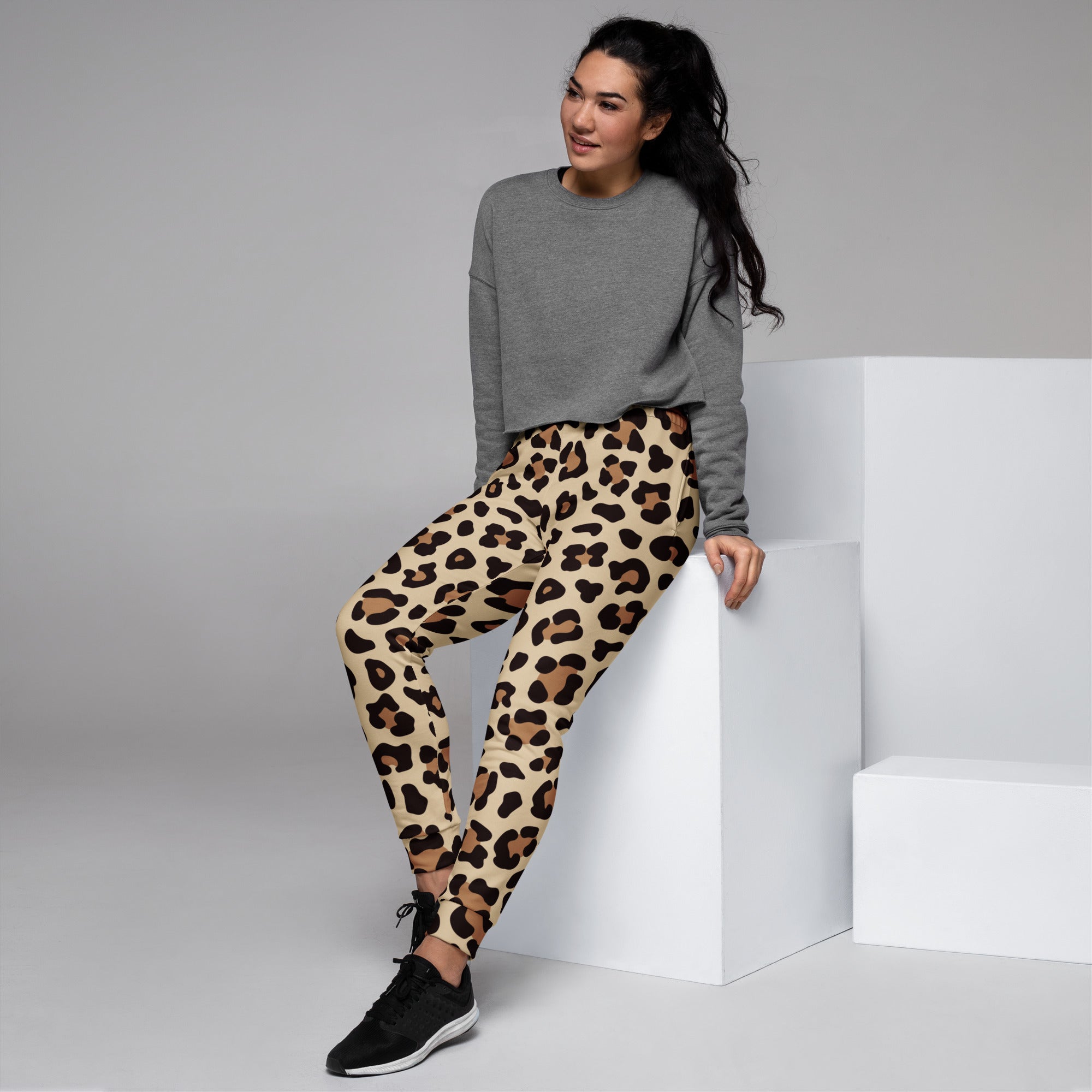 Women’s beige and brown leopard print recycled jogger pants with pockets and cozy brushed inside fleece lining