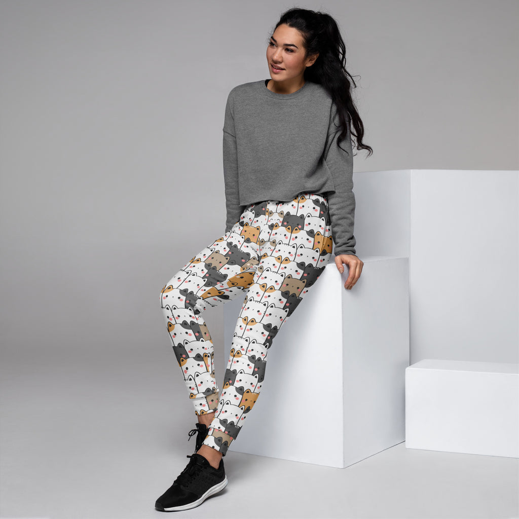 White womens kawaii cat recycled jogger pants with cozy fleece inside and colorful cartoon cat pattern
