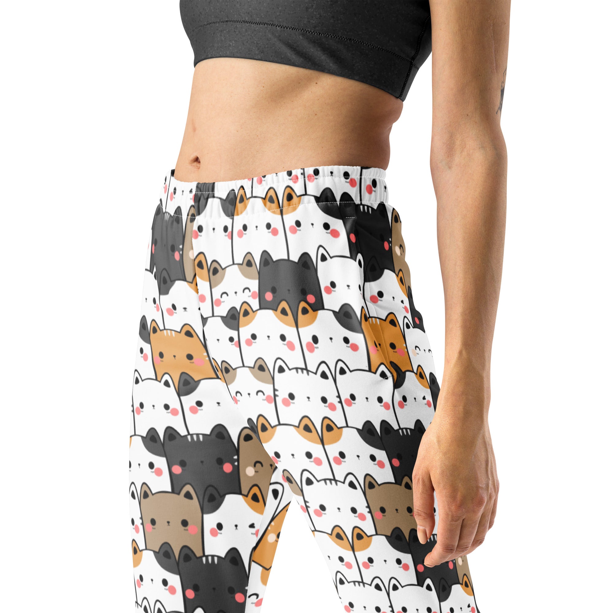 White women’s kawaii cat recycled jogger pants with cozy brushed fleece inside and playful black white orange cat print