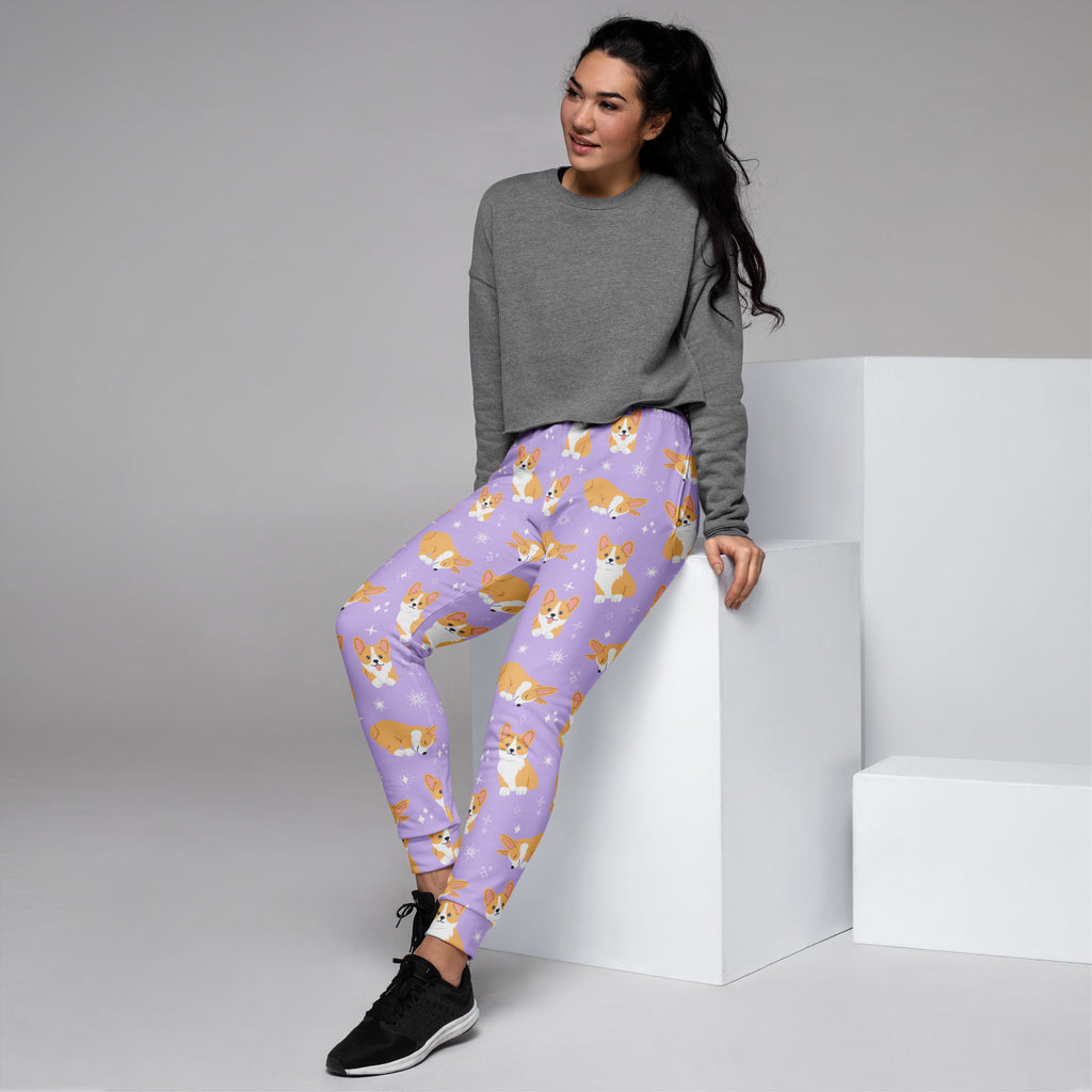 Women’s purple corgi dog recycled jogger pants with cozy brushed fleece inside featuring cartoon corgi pattern