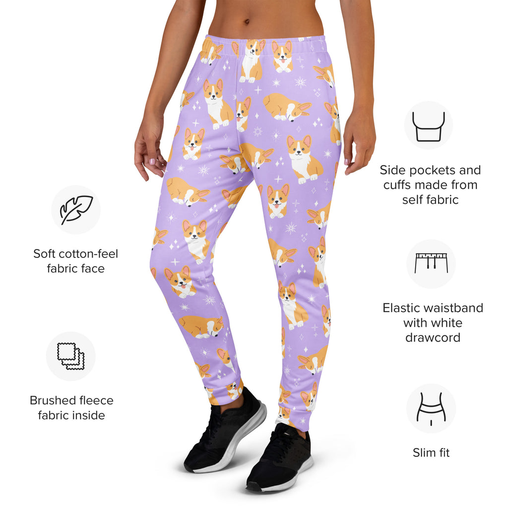 Women’s purple recycled jogger pants with pockets featuring orange and white corgi dogs and sparkling star accents