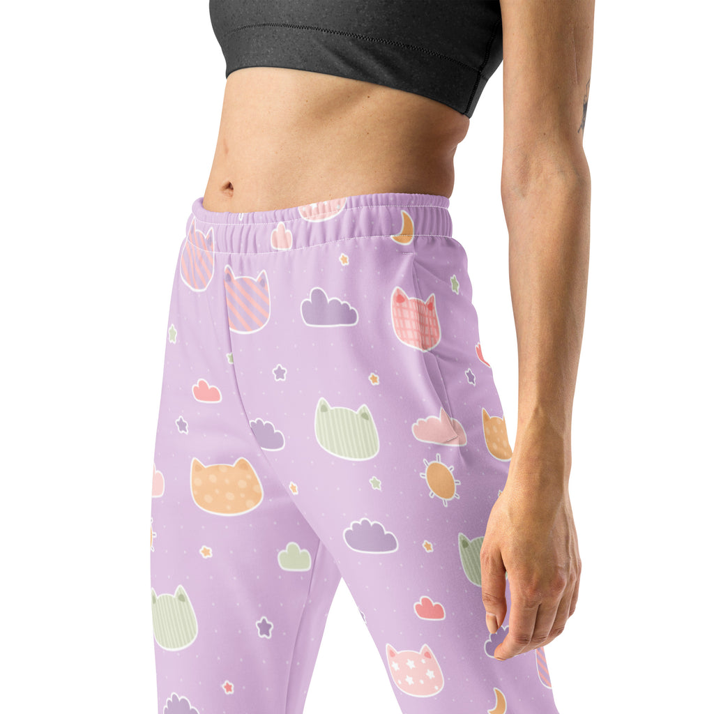 Women’s lilac recycled jogger pants with cozy fleece lining featuring pastel kawaii cats clouds and stars pattern