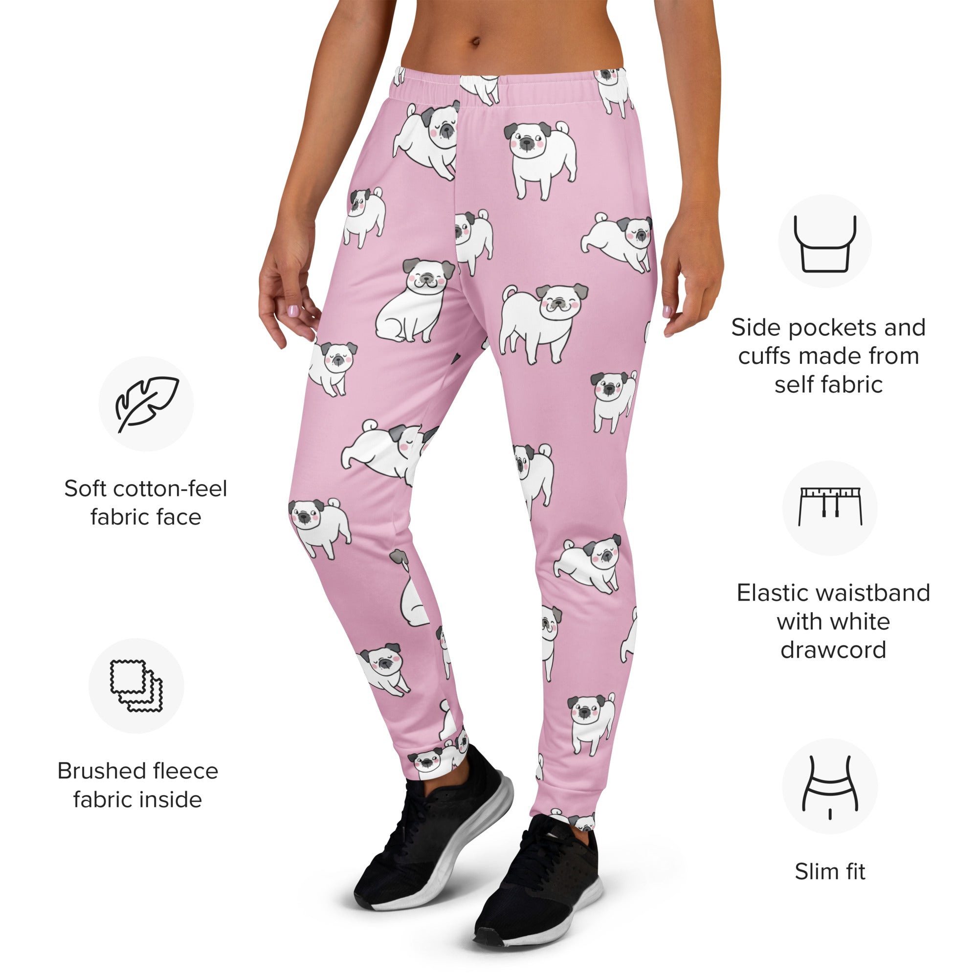 Women’s pink recycled jogger pants with cozy brushed fleece inside and playful white pug illustrations with pockets