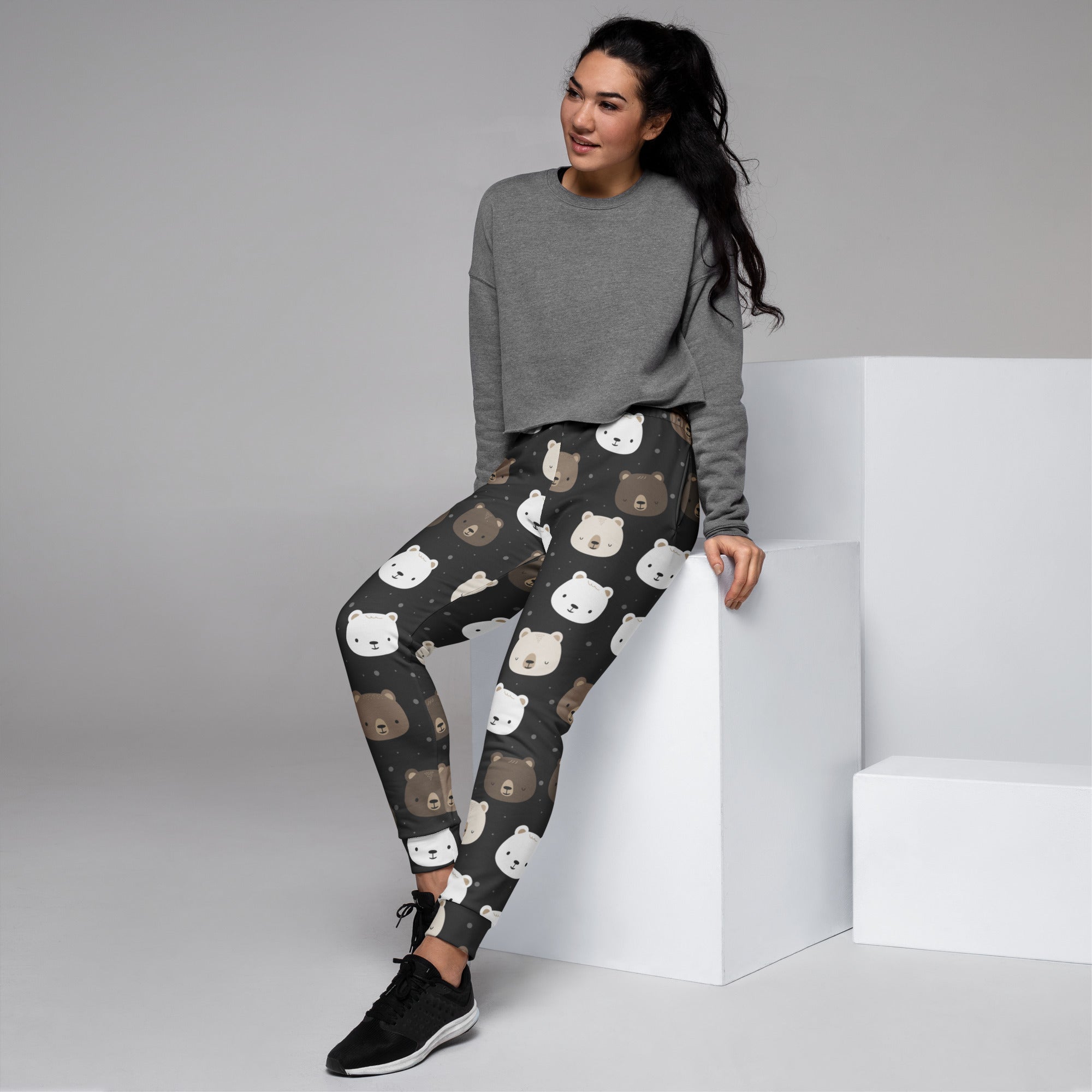 Dark gray women’s recycled jogger pants with playful white and brown bear faces and cozy brushed inside fleece