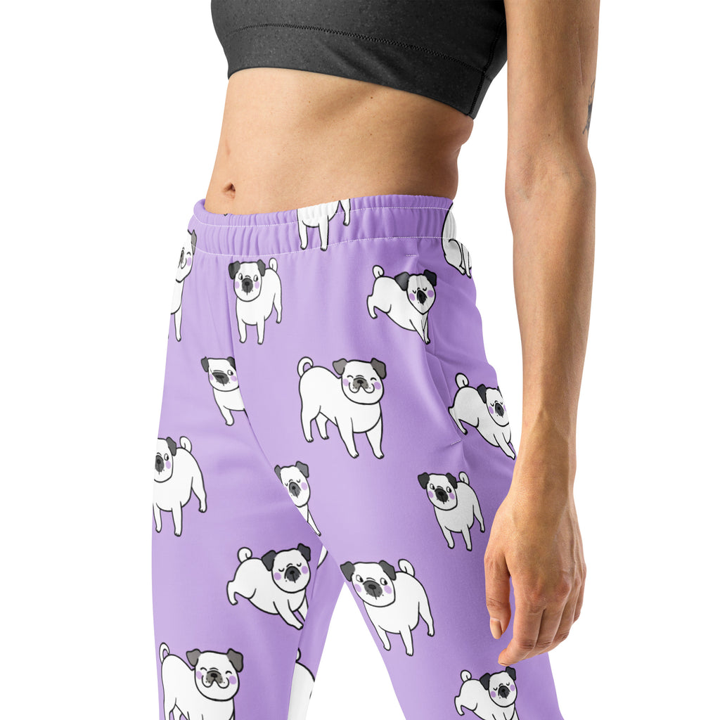 Women’s purple recycled jogger pants with cozy brushed fleece inside featuring white cartoon pugs pattern