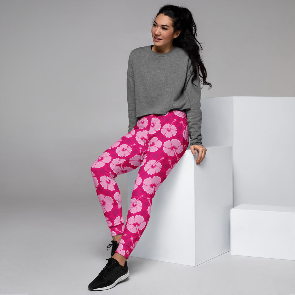 Women’s fuchsia hibiscus floral leggings made from recycled fabric with cozy brushed fleece and pockets