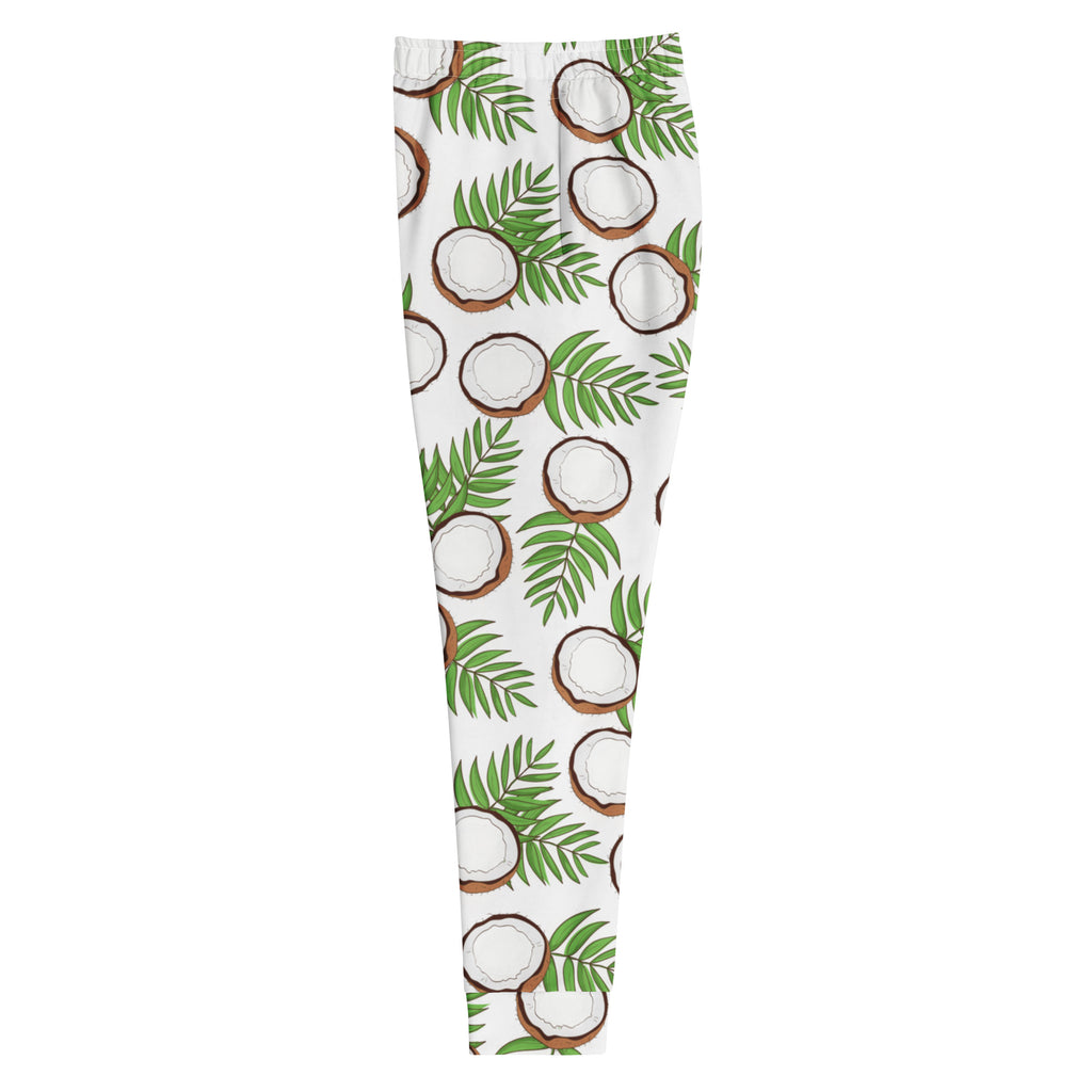 White leggings with a repeating pattern of illustrated coconuts and green palm leaves made from cozy brushed fleece