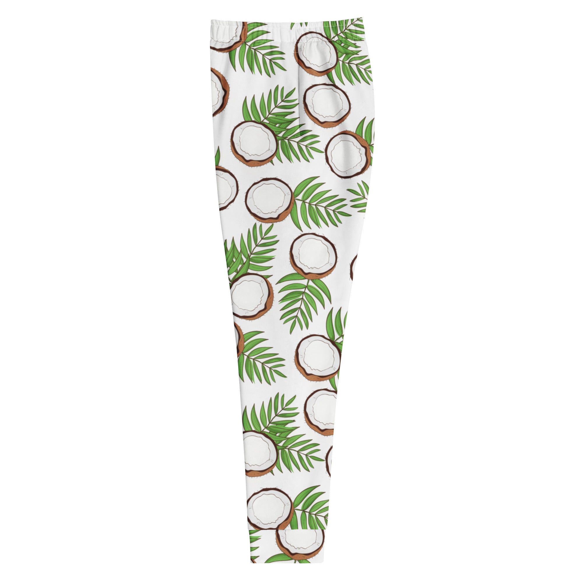 White leggings with a repeating pattern of illustrated coconuts and green palm leaves made from cozy brushed fleece