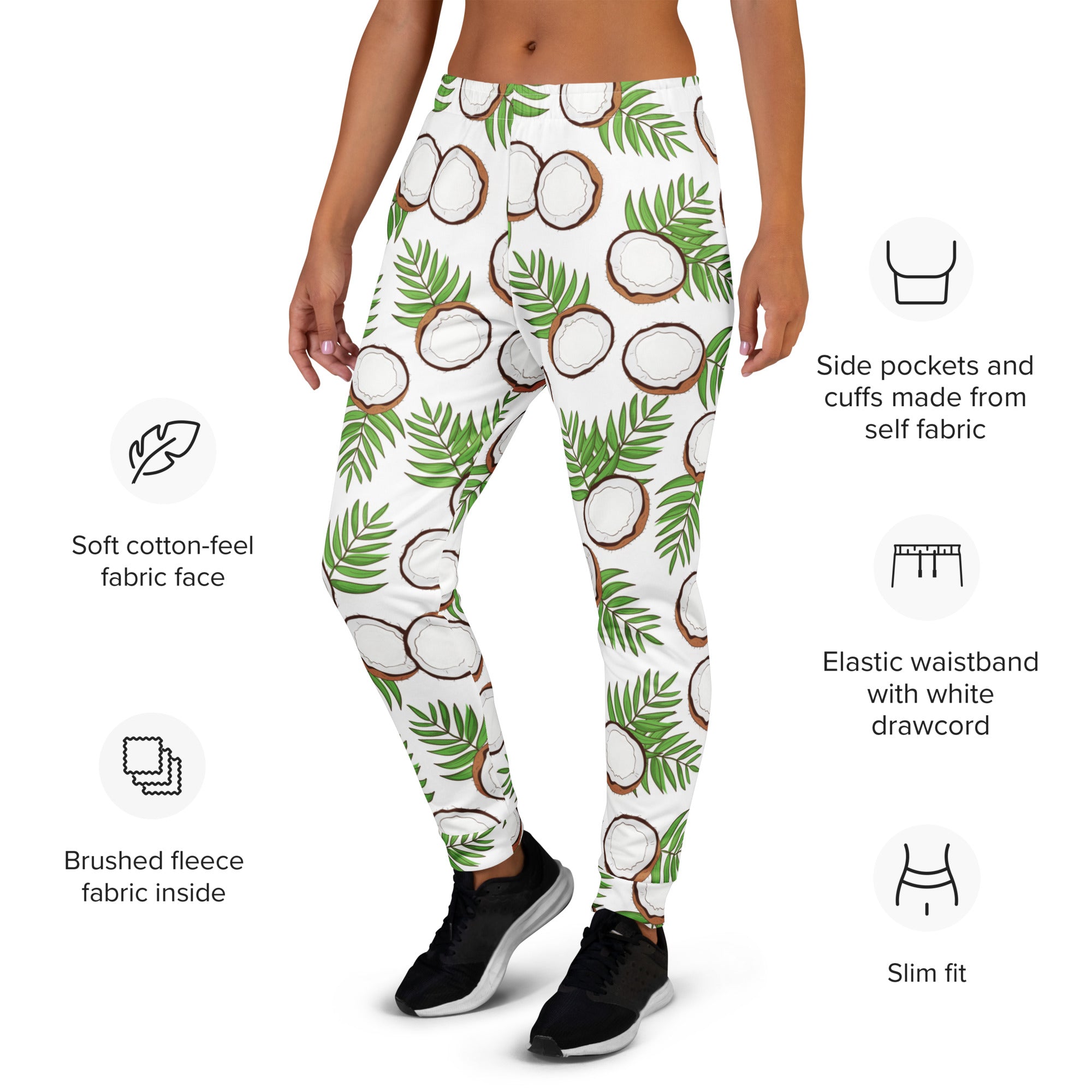 Women’s white tropical-themed jogger pants with green palm leaves brown coconuts soft cotton-feel and fleece lining