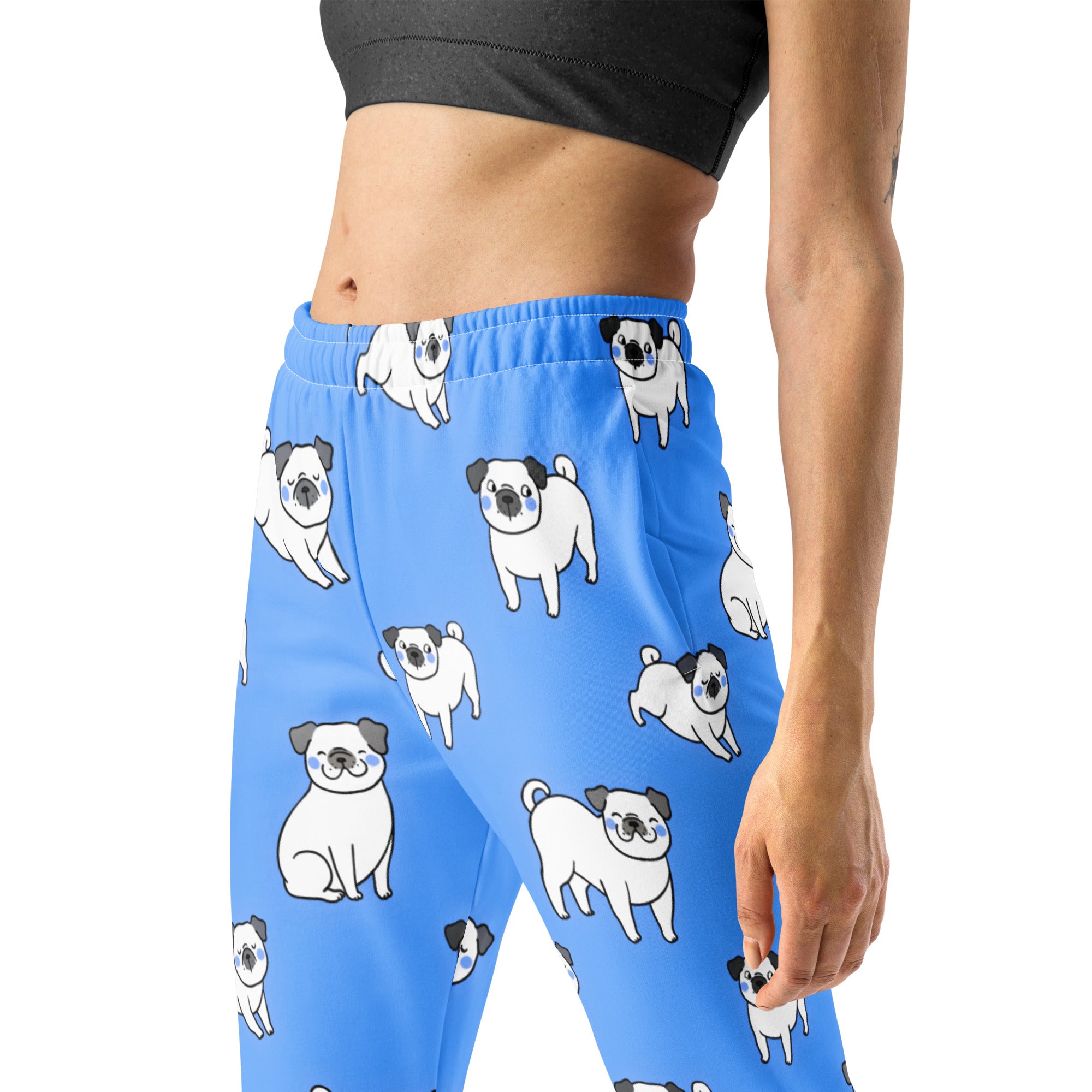 Women’s blue recycled jogger pants with pockets featuring white pugs with black ears cozy brushed fleece lining