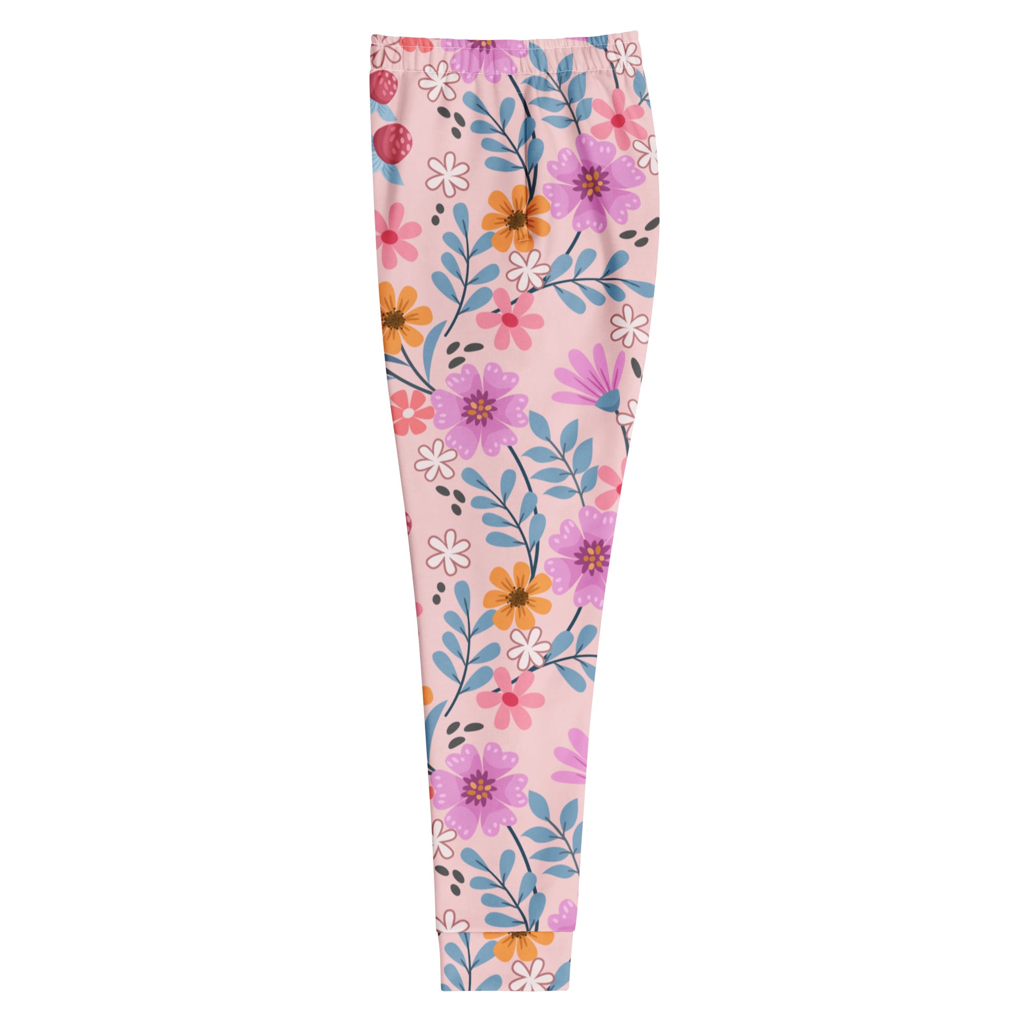 Women’s pink floral recycled jogger pants with pockets featuring purple orange flowers and blue leaves on blush fleece