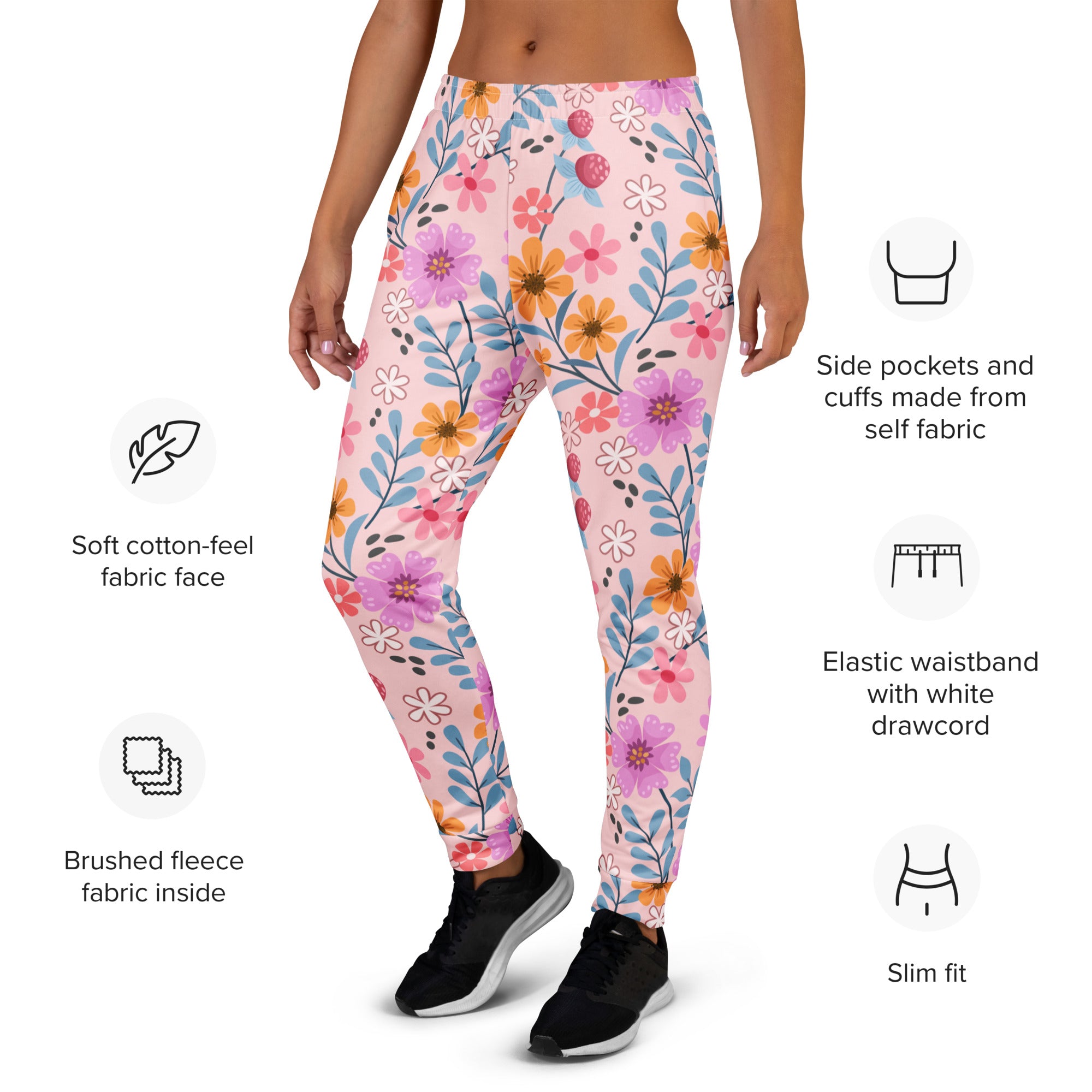 Women’s pink floral recycled jogger pants with soft cotton-feel fabric and cozy brushed fleece lining with pockets