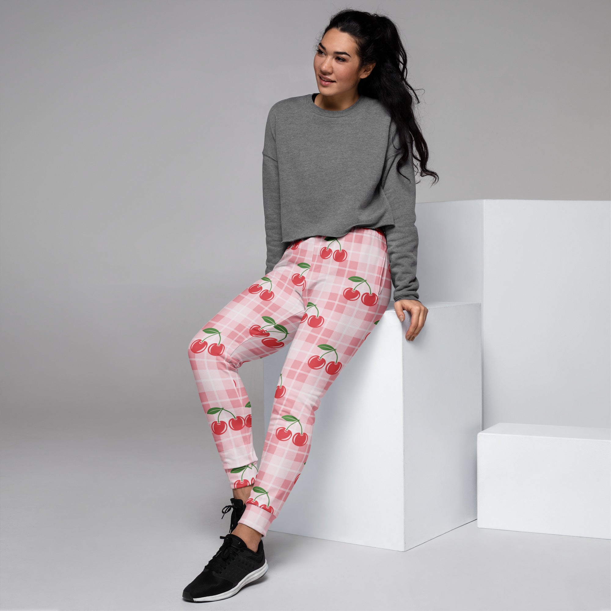 Women’s pink cherry-print plaid recycled jogger pants with pockets and cozy brushed inside fleece lining