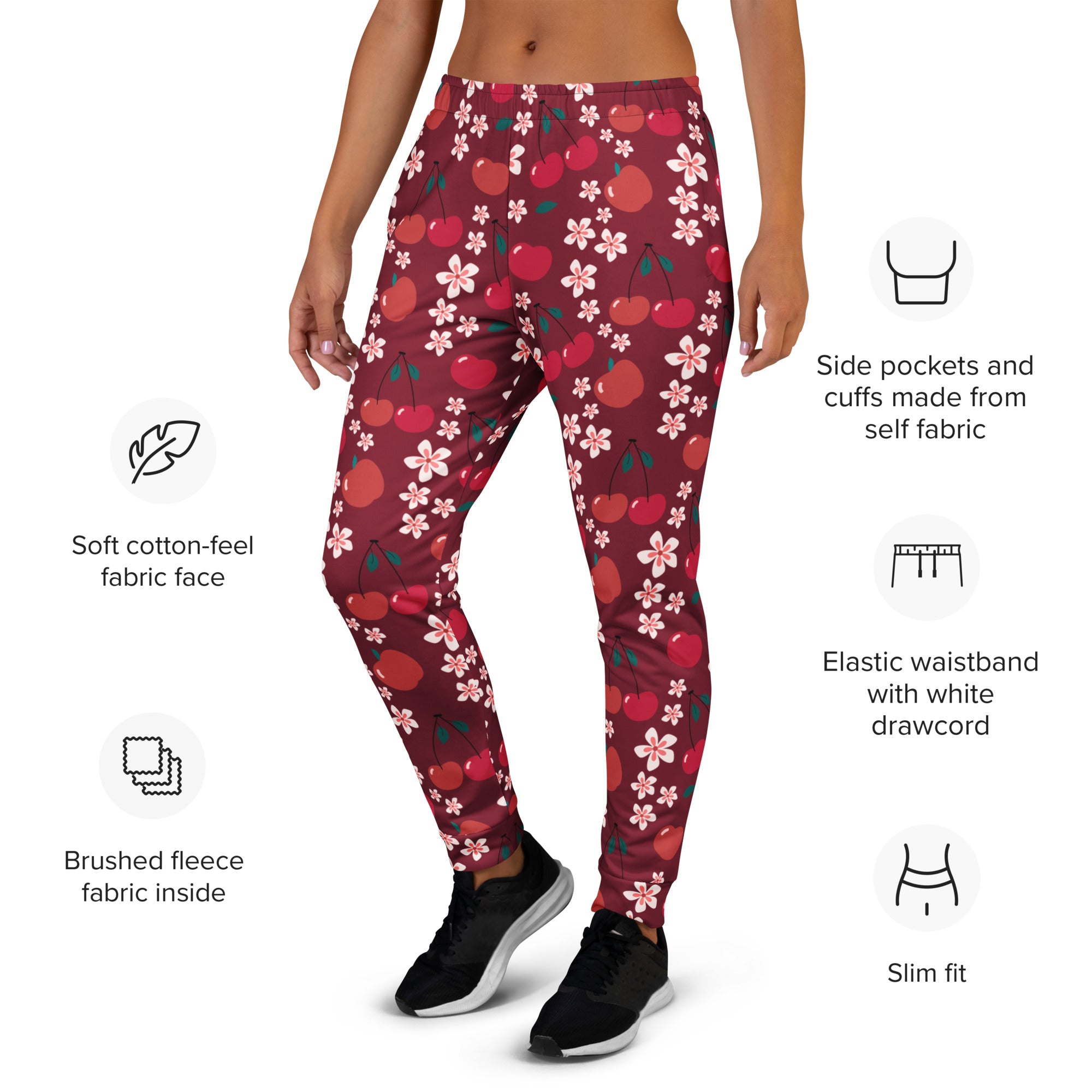 Women’s maroon cherry blossom jogger pants with pockets featuring soft cotton-feel fabric and cozy brushed fleece lining