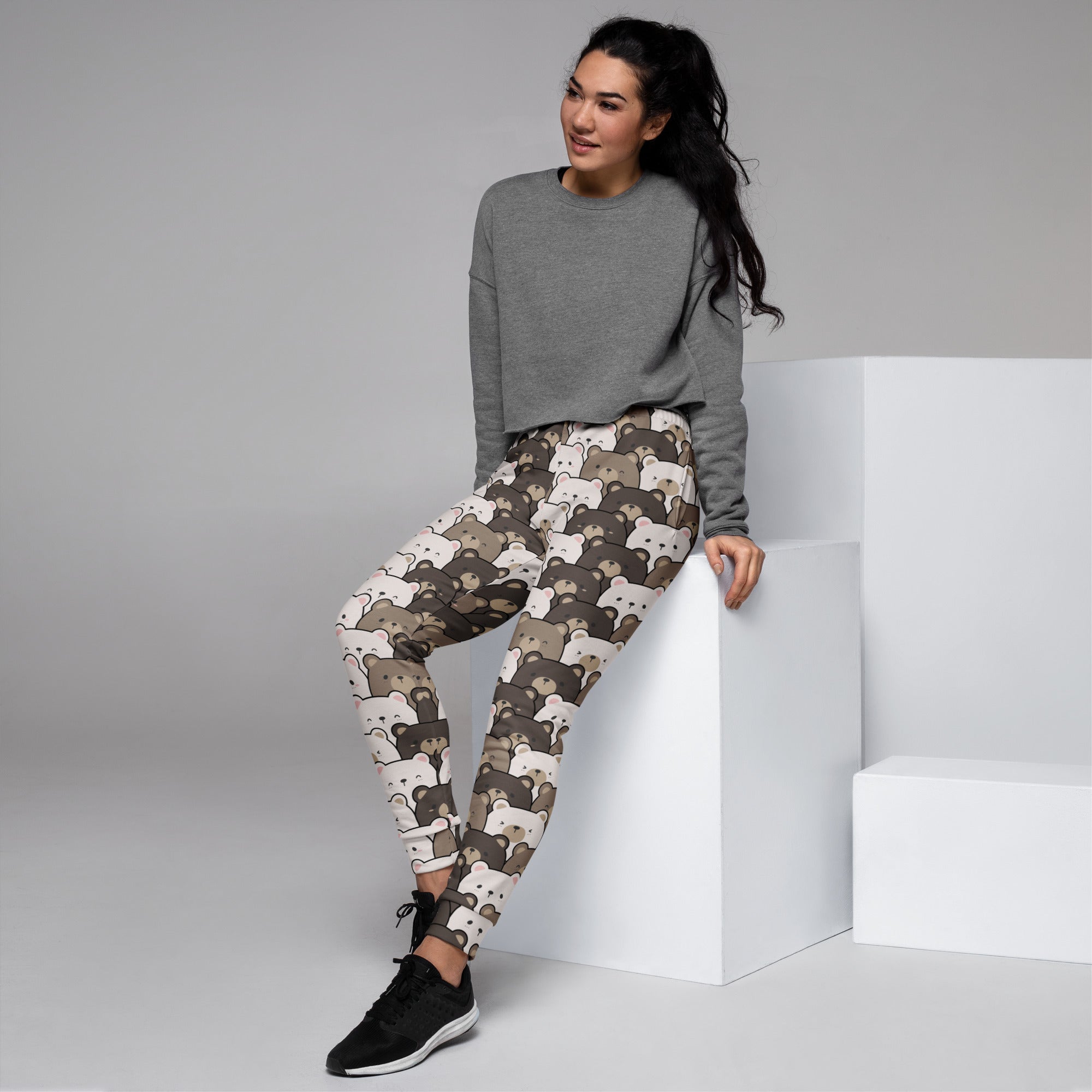 Women’s bear face recycled jogger pants in soft beige and brown with elastic waistband and cozy brushed fleece interior