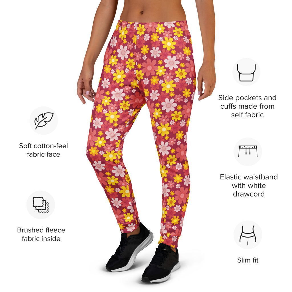 Women’s red floral recycled jogger pants with pockets featuring a pink and yellow floral pattern and soft cotton-feel fabric